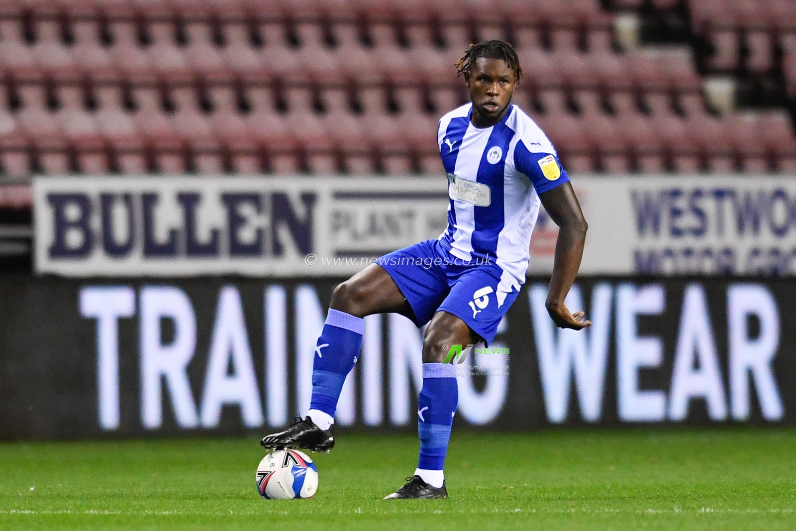 Darnell Johnson (6) of Wigan Athletic with the ball