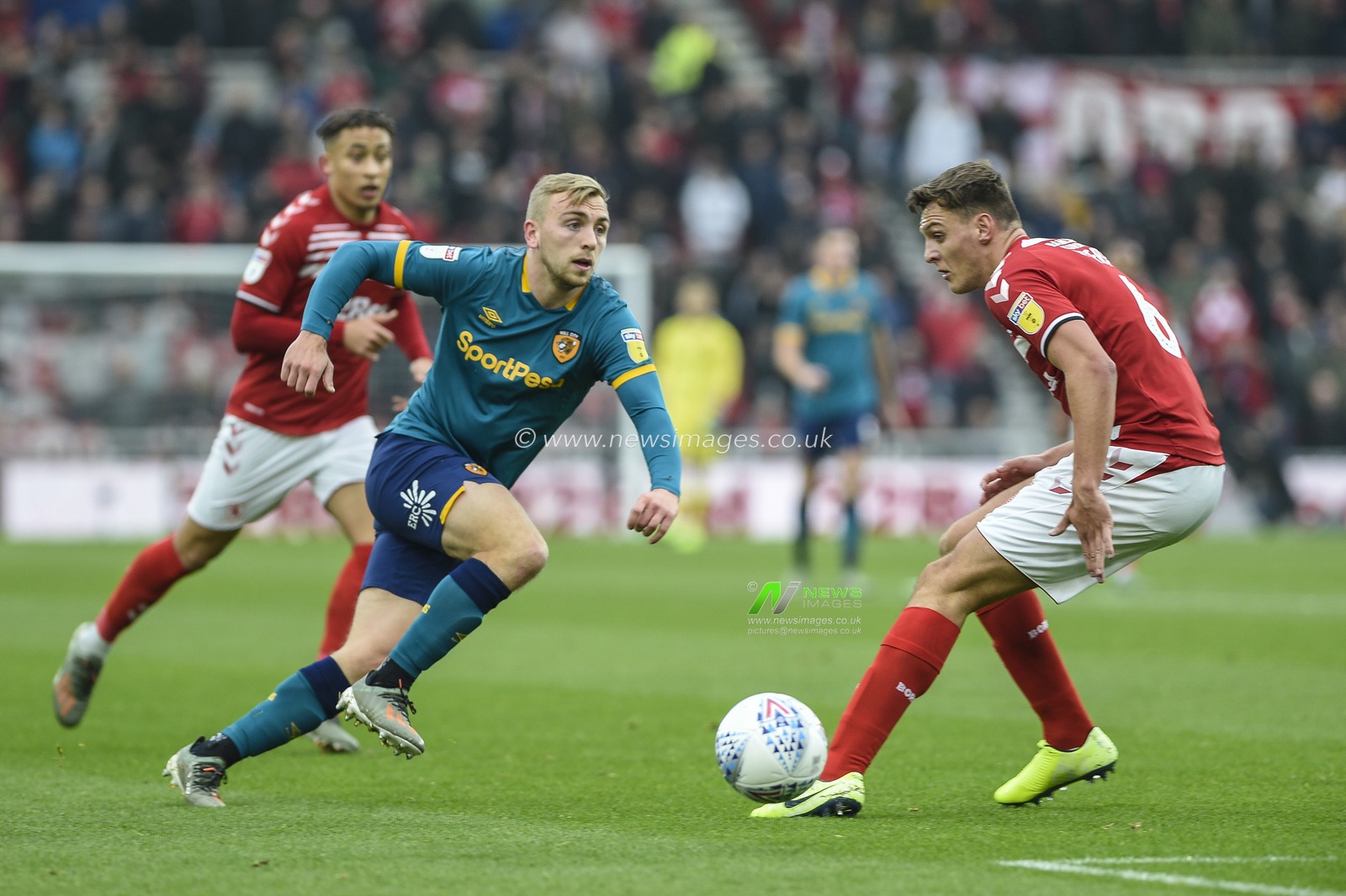 24th November 2019, Riverside Stadium, Middlesbrough, England; Sky Bet Championship, Middlesbrough v Hull City : Jarrod Bowen (20) of Hull City takes on Dael Fry (6) of Middlesbrough

Credit: Iam Burn/News Images