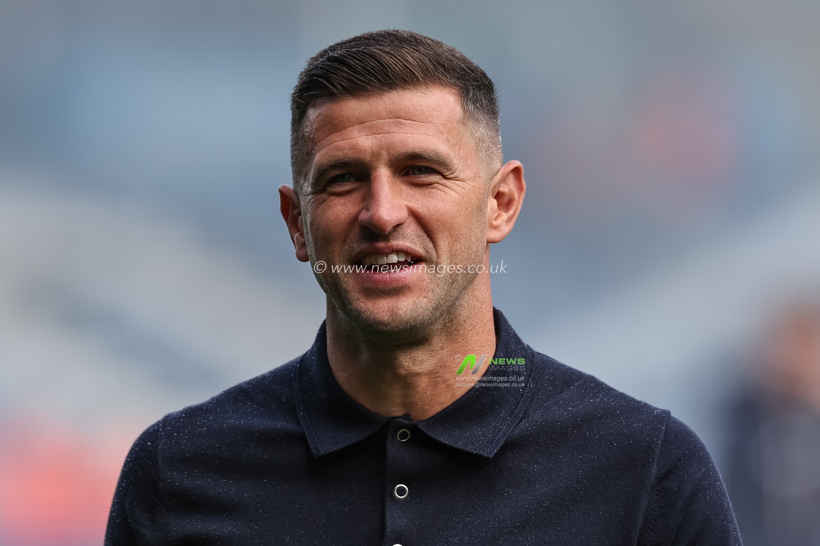 John Mousinho manager of Portsmouth full of smiles as he arrives during the Sky Bet Championship match Leeds United vs Portsmouth at Elland Road, Leeds, United Kingdom, 10th August 2024

(Photo by Mark Cosgrove/News Images)