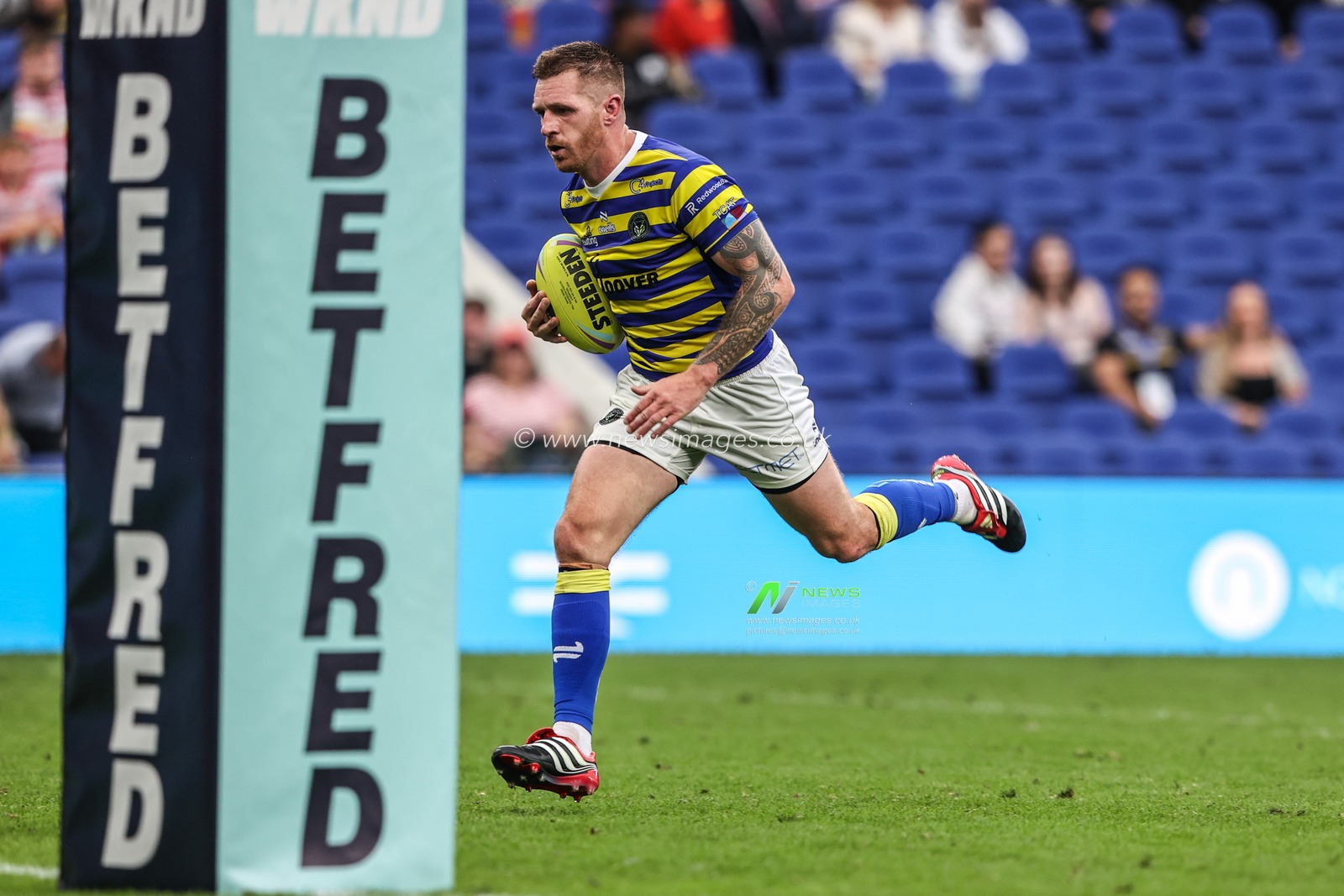 Marc Sneyd of Warrington Wolves goes over for a try during the Betfred Super League Magic Weekend match Leigh Leopards vs Warrington Wolves at Leigh Sports Village, Leigh, United Kingdom on 04 July 2026

(Photo by Alfie Cosgrove/News Images)