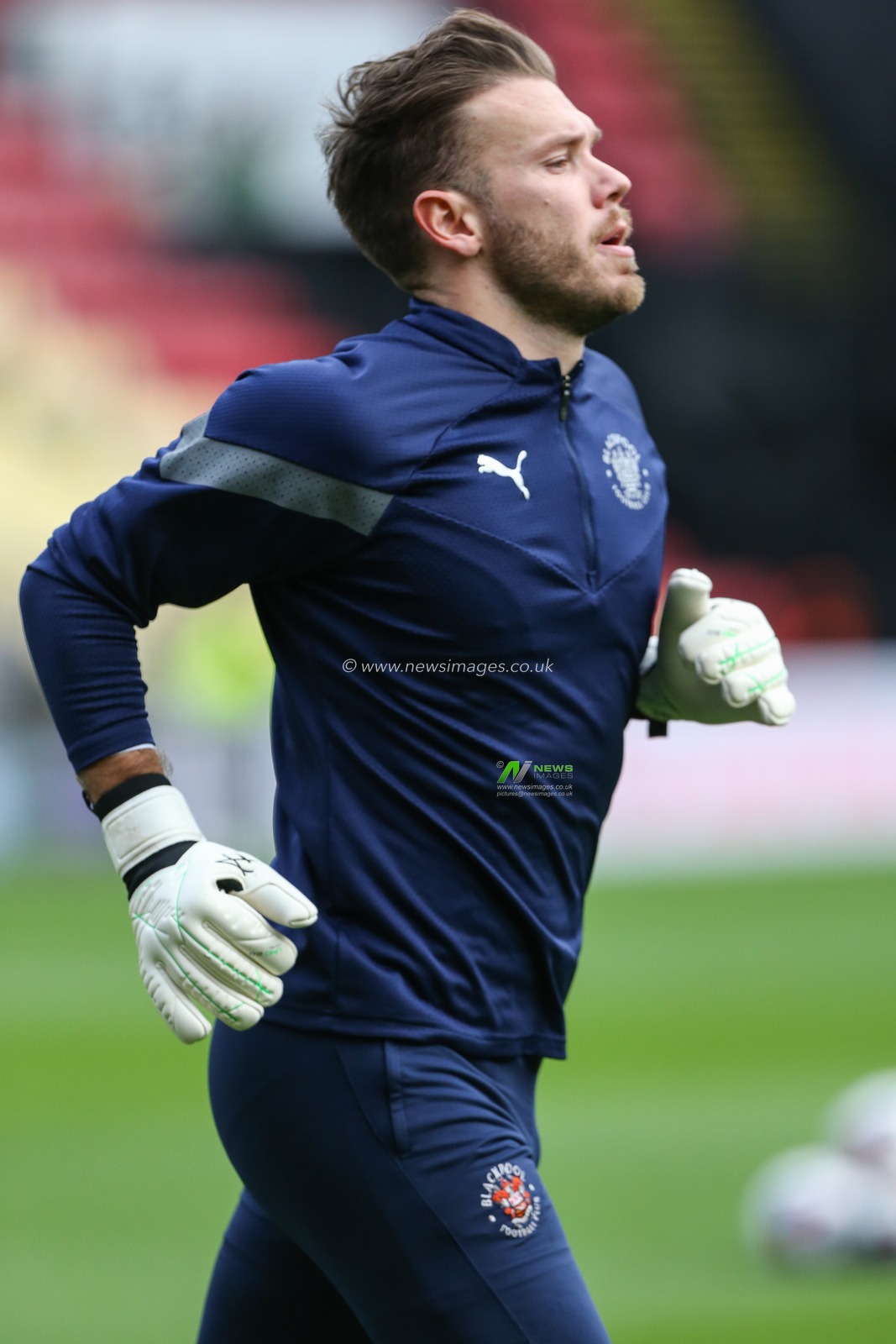 Chris Maxwell #1 of Blackpool warms up during the Sky Bet Championship match Watford vs Blackpool at Vicarage Road, Watford, United Kingdom, 14th January 2023

(Photo by Arron Gent/News Images)