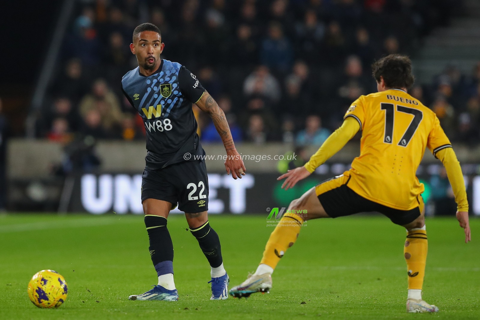 Vitinho #22 of Burnley passes the ball during the Premier League match Wolverhampton Wanderers vs Burnley at Molineux, Wolverhampton, United Kingdom, 5th December 2023

(Photo by Gareth Evans/News Images)