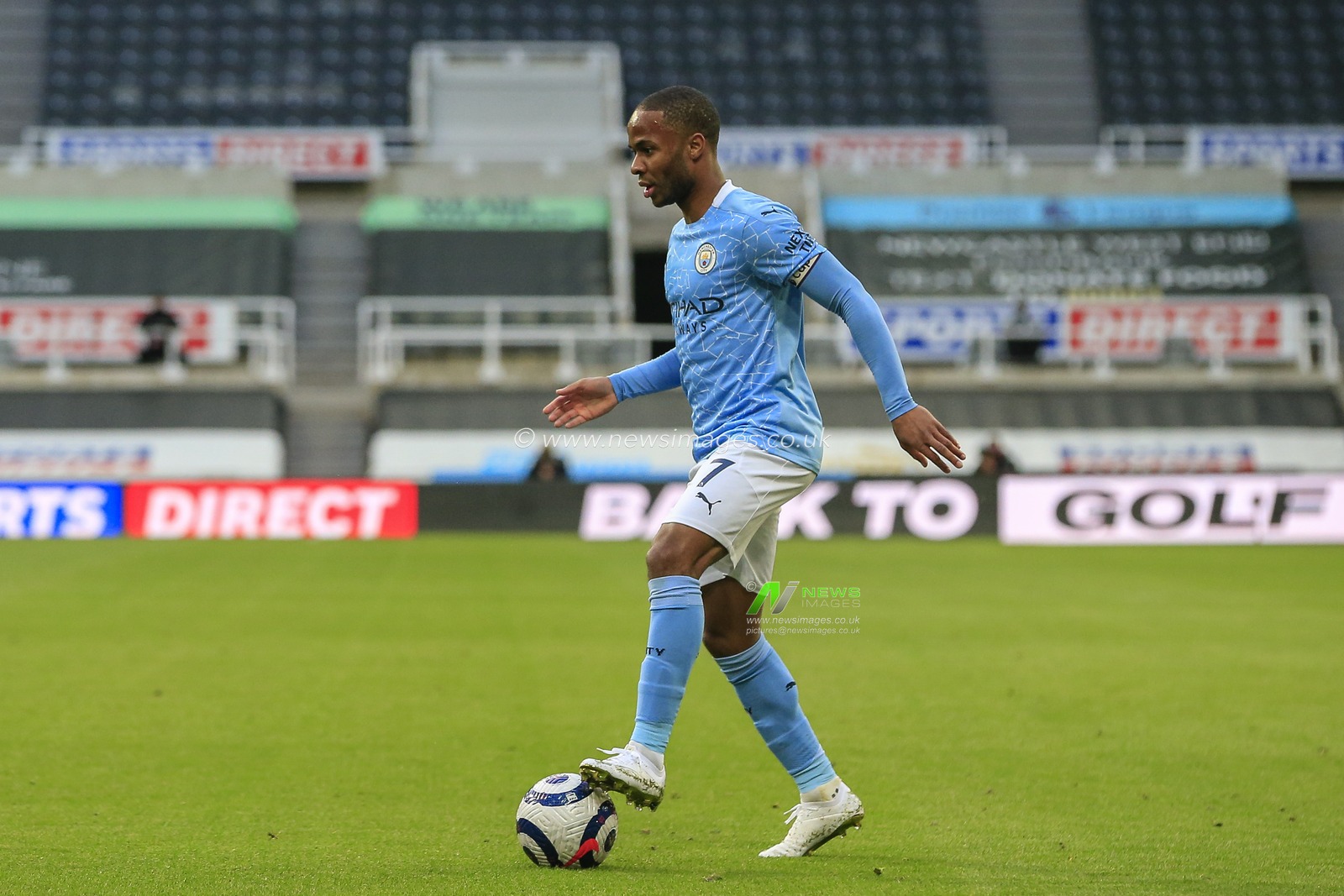Raheem Sterling #7 of Manchester City with the ball