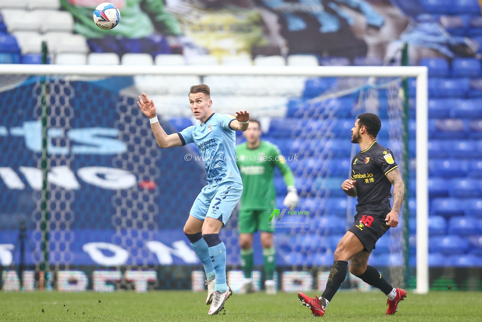 Leo Ostigard #2 of Coventry City heads the ball clear