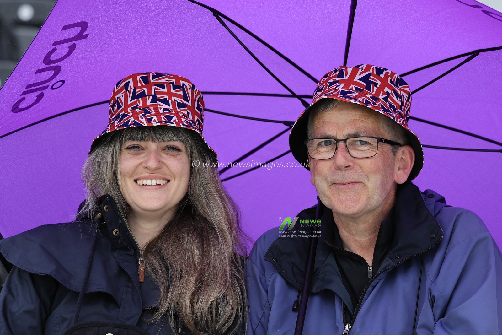Cricket fans sheltering from the drizzle ahead of the LV= Insurance Ashes Test Series Fourth Test Day Five match England vs Australia at Old Trafford, Manchester, United Kingdom, 23rd July 2023

(Photo by Conor Molloy/News Images)