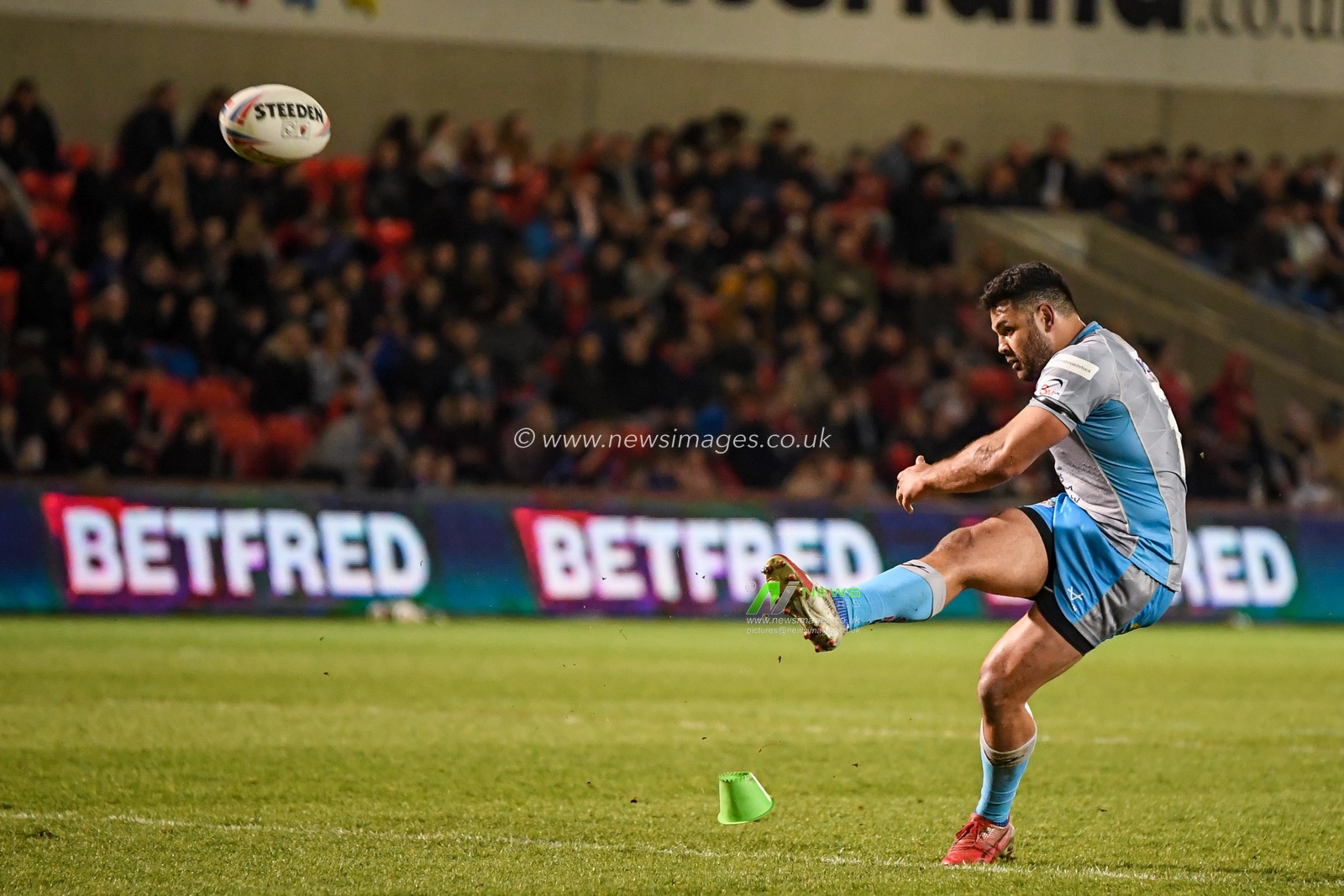 Rhyse Martin #12 of Leeds Rhinos successfully kicks a conversion to make it 0-6