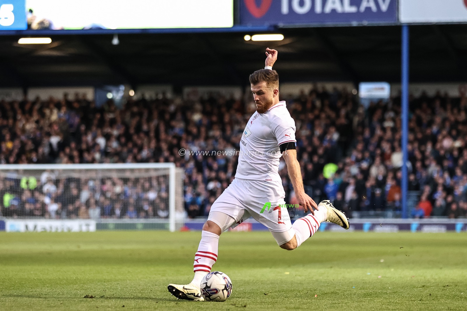 Nicky Cadden of Barnsley crosses the ball during the Sky Bet League 1 match Portsmouth vs Barnsley at Fratton Park, Portsmouth, United Kingdom, 16th April 2024

(Photo by Mark Cosgrove/News Images)