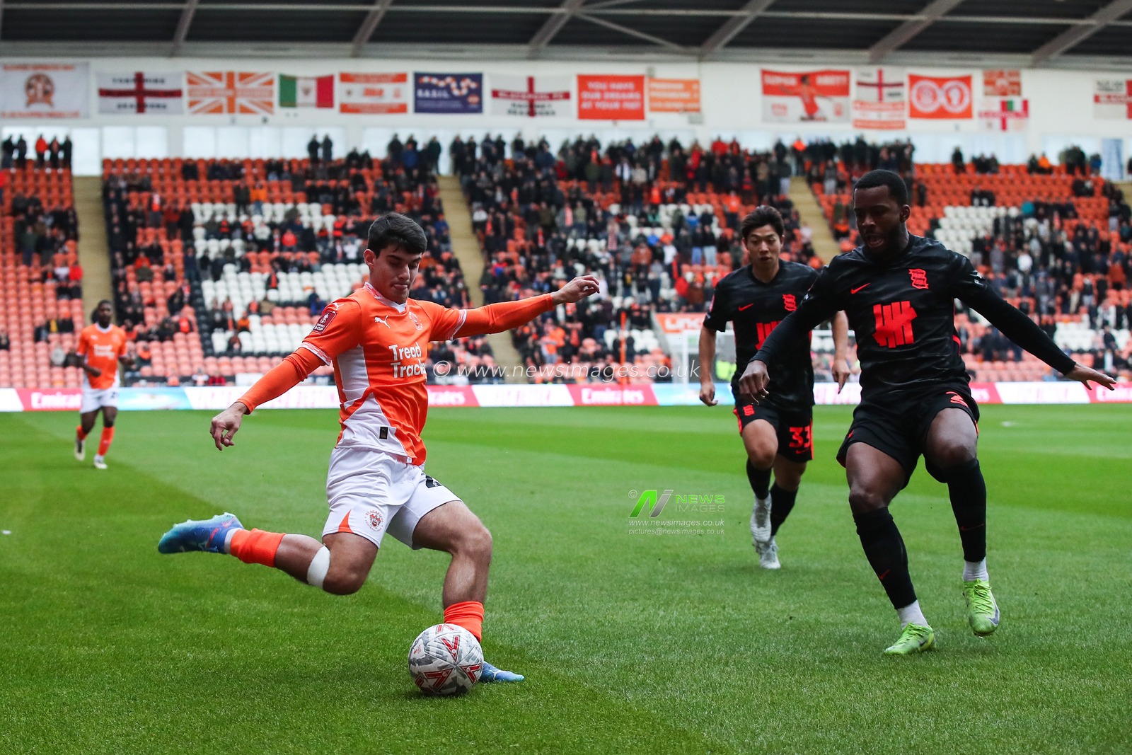 Rob Apter of Blackpool crosses the ball during the Emirates FA Cup 2nd Round match Blackpool vs Birmingham City at Bloomfield Road, Blackpool, United Kingdom, 1st December 2024

(Photo by Gareth Evans/News Images)