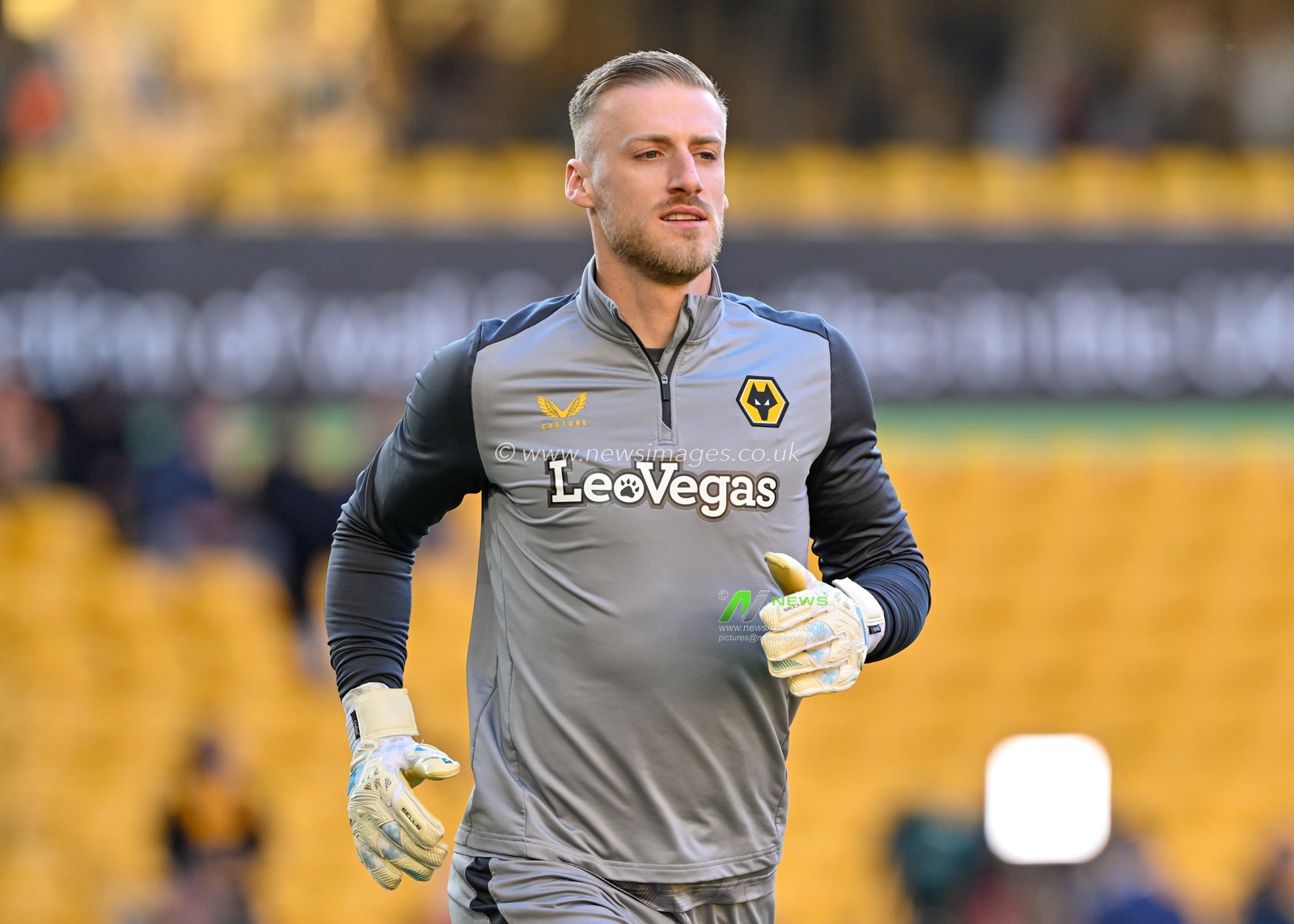 Daniel Bentley of Wolverhampton Wanderers warms up ahead of the match, during the Premier League match Wolverhampton Wanderers vs Arsenal at Molineux, Wolverhampton, United Kingdom, 20th April 2024

(Photo by Cody Froggatt/News Images)
