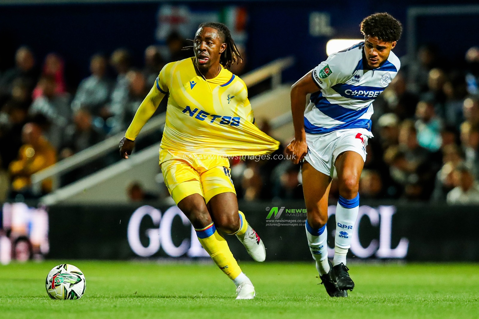 Eberechi Eze of Crystal Palace battles for the ball with Jonathan Varane of Queens Park Rangers during the Carabao Cup match Queens Park Rangers vs Crystal Palace at Kiyan Prince Foundation Stadium, London, United Kingdom, 17th September 2024

(Photo by Izzy Poles/News Images)
