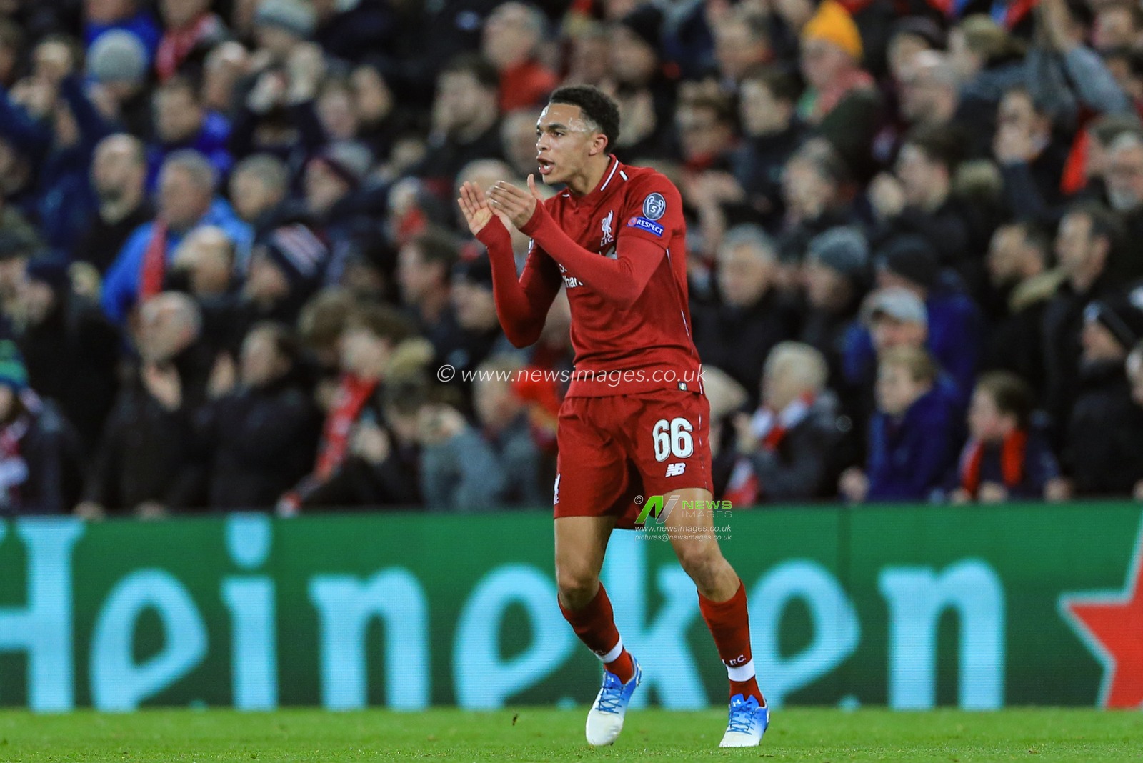 11th December 2018, Anfield, Liverpool, England; UEFA Champions League, Liverpool v Napoli ;  Trent Alexander-Arnold (66) of Liverpool celebrates Mohamed Salah (11) of Liverpool goal to make it 1-0 



  Credit: Mark Cosgrove/News Images