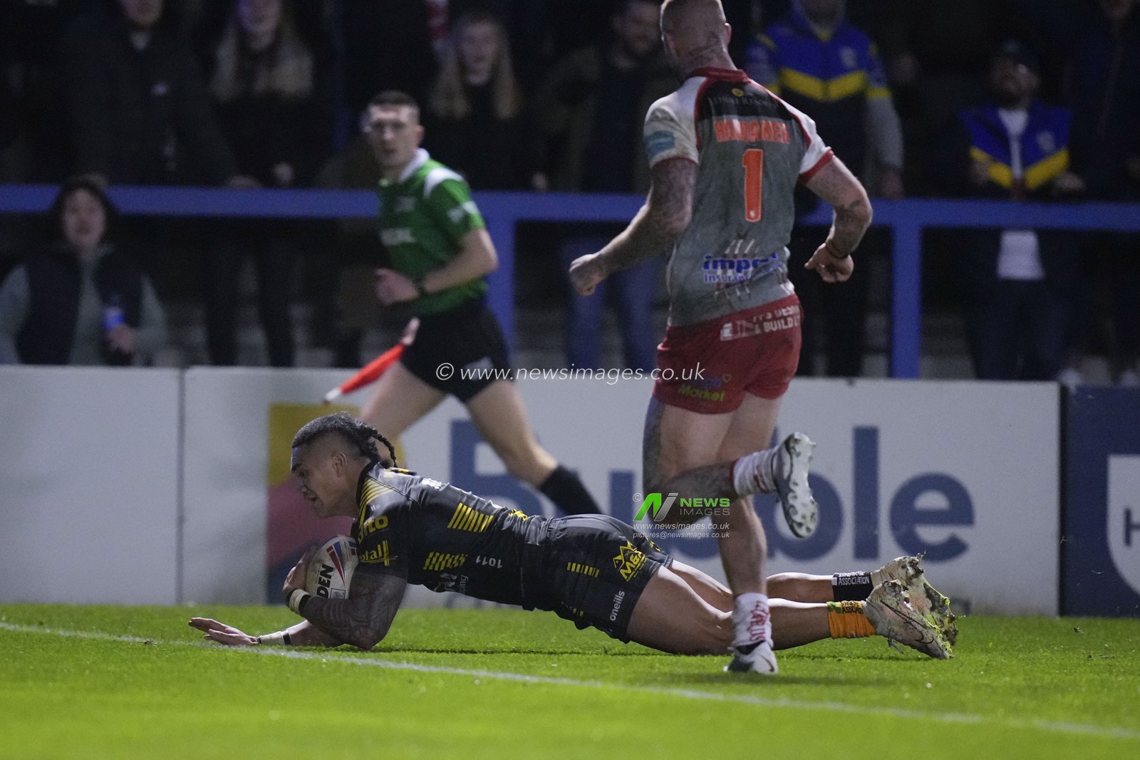 Peter Mataâ€™utia #3 of Warrington Wolves dives over to score a try during the Rugby League Ben Currie Testimonial match Warrington Wolves vs Leigh Leopards at Halliwell Jones Stadium, Warrington, United Kingdom, 4th February 2023

(Photo by Steve Flynn/News Images)