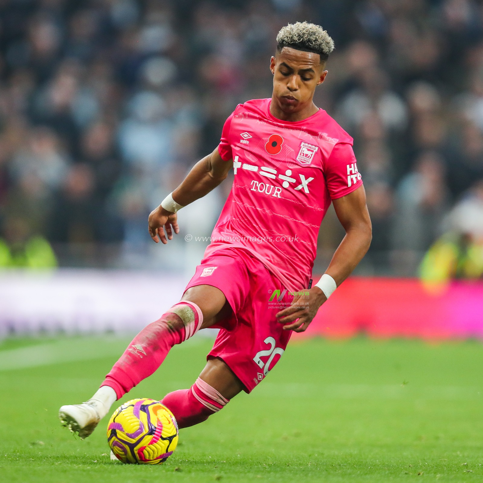Omari Hutchinson of Ipswich Town runs with the ball during the Premier League match Tottenham Hotspur vs Ipswich Town at Tottenham Hotspur Stadium, London, United Kingdom, 10th November 2024

(Photo by Izzy Poles/News Images)