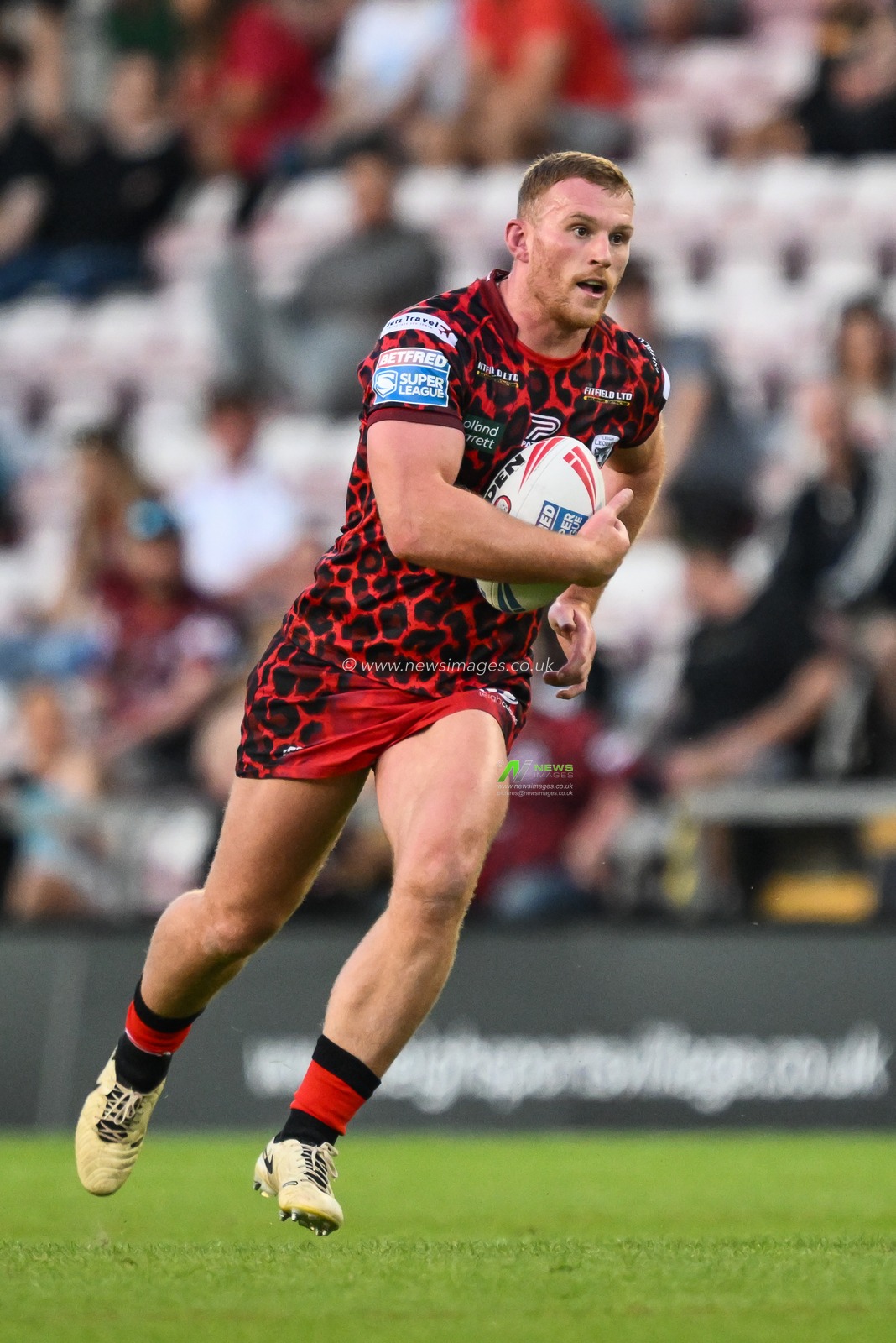 Jack Hughes of Leigh Leopards makes a break during the Betfred Super League Round 11 match Leigh Leopards vs Salford Red Devils at Leigh Sports Village, Leigh, United Kingdom, 10th May 2024

(Photo by Craig Thomas/News Images)