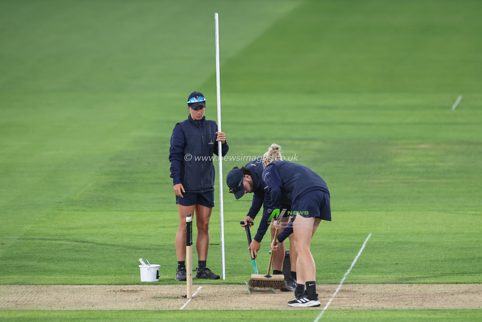 Ground Staff make repairs to the crease during a break in play during the 1st Rothesay Test Match day 1 England v West Indies at Lords, London, United Kingdom, 10th July 2024

(Photo by Mark Cosgrove/News Images)