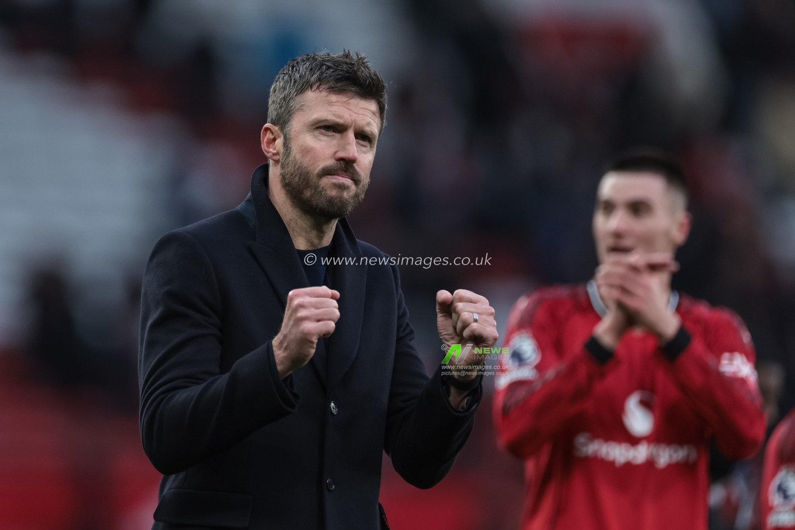 Michael Carrick manager of Manchester United celebrates the 3-2 win with the fans during the Premier League match Manchester United vs Fulham at Old Trafford, Manchester, United Kingdom, 1st February 2026

(Photo by Mark Cosgrove/News Images)