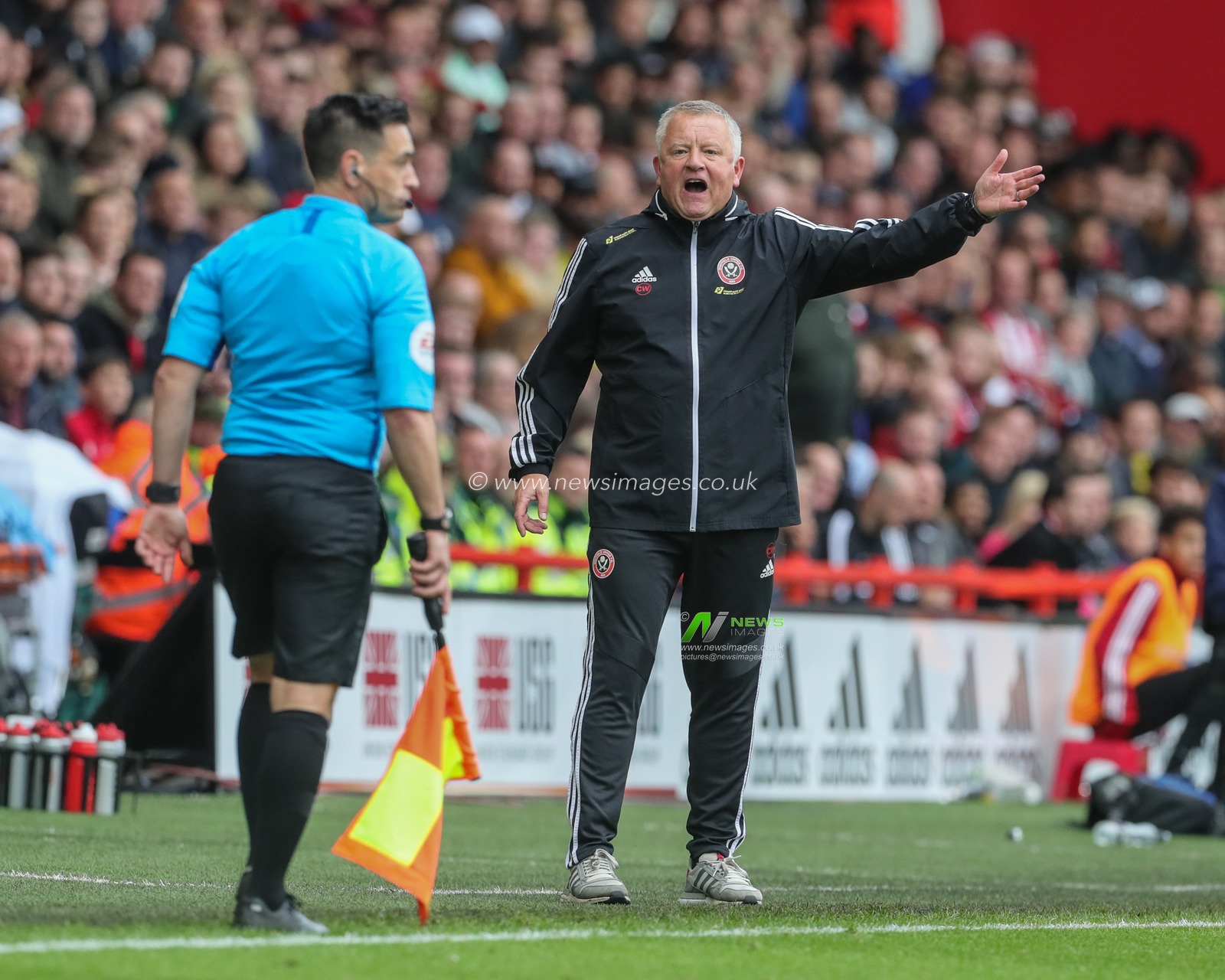 28th September 2019, Bramall Lane, Sheffield, England; Premier League, Sheffield United v Liverpool : Chris Wilder manager of Sheffield United reacts with the linesman as he gives Liverpool a foul 

Credit: Mark Cosgrove/News Images