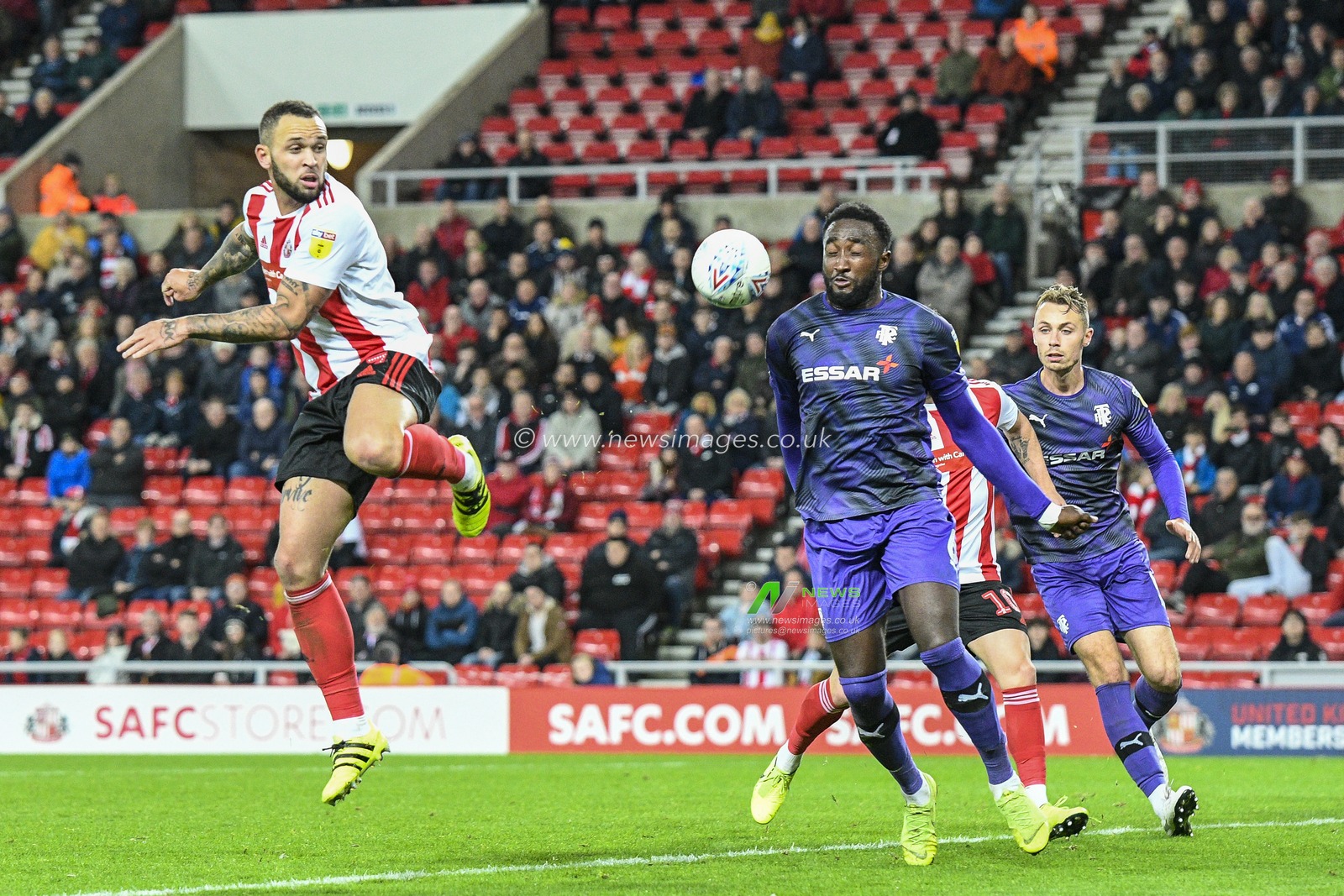 22nd October 2019, Stadium Of Light, Sunderland, England; Sky Bet League 1, Sunderland v Tranmere Rovers : Joel Lynch of Sunderland flicks the ball in to the box as Emmanuel Monthe of Tranmere Rovers tries to block

Credit: Iam Burn/News Images