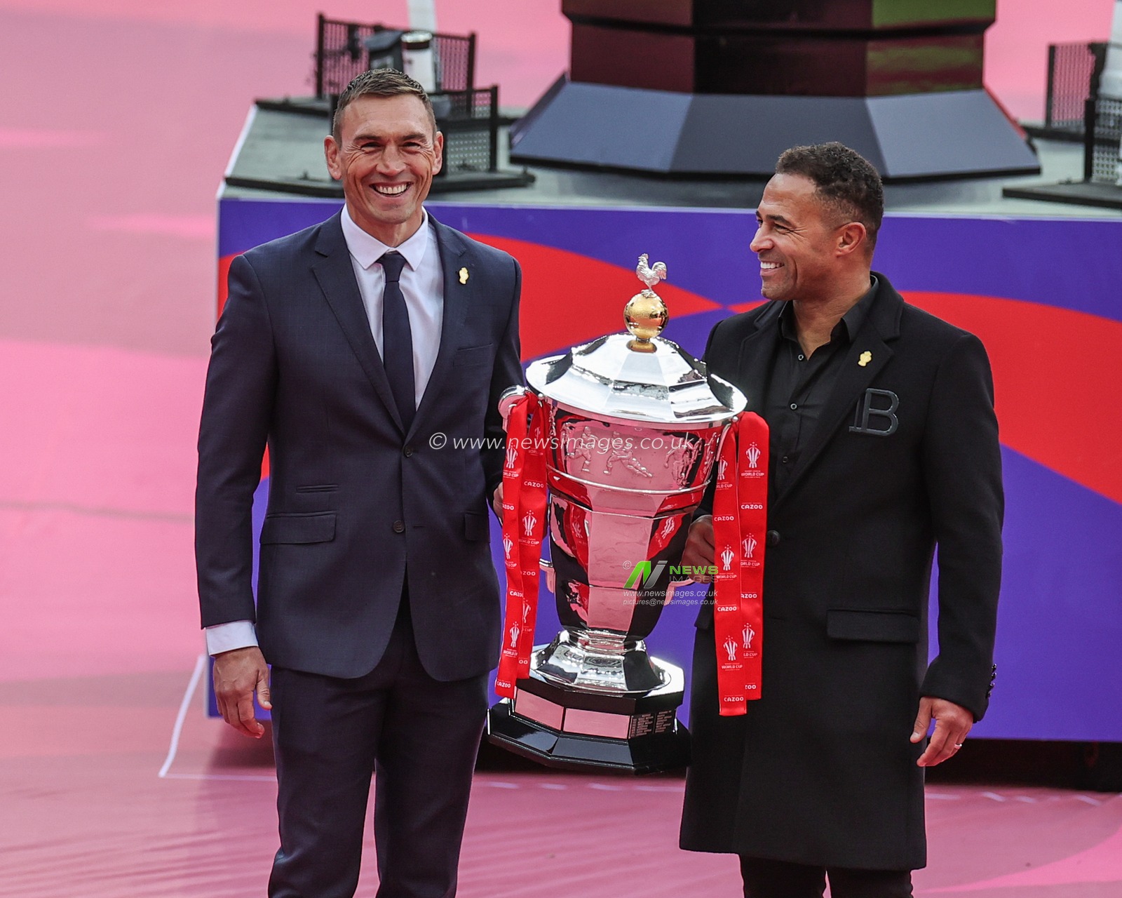 Kevin Sinfield OBE and Jason Robinson OBE with the Rugby League World Cup Trophy during the Rugby League World Cup 2021 match England vs Samoa at St. James's Park, Newcastle, United Kingdom, 15th October 2022

(Photo by Mark Cosgrove/News Images)