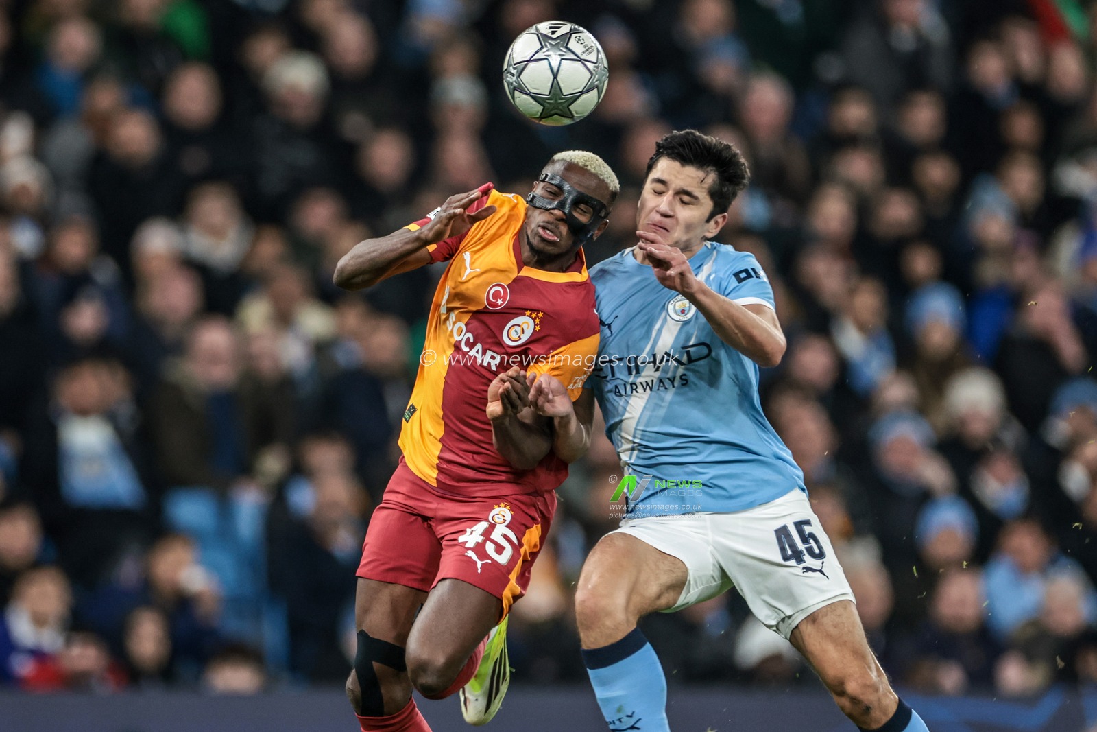 Victor Osimhen of Galatasaray and Abdukodir Khusanov of Manchester City battle for the ball during the UEFA Champions League Matchday 8 of 8 match Manchester City vs Galatasaray at City of Manchester Stadium, Manchester, United Kingdom on 28 January 2026

(Photo by Mark Cosgrove/News Images)
