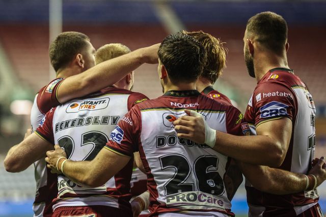 Zach Eckersley of Wigan Warriors celebrates his try during the Betfred Super League round 20 match Wigan Warriors vs Catalans Dragons at The Brick Community Stadium, Wigan, United Kingdom, 25th July 2025

(Photo by Alfie Cosgrove/News Images)