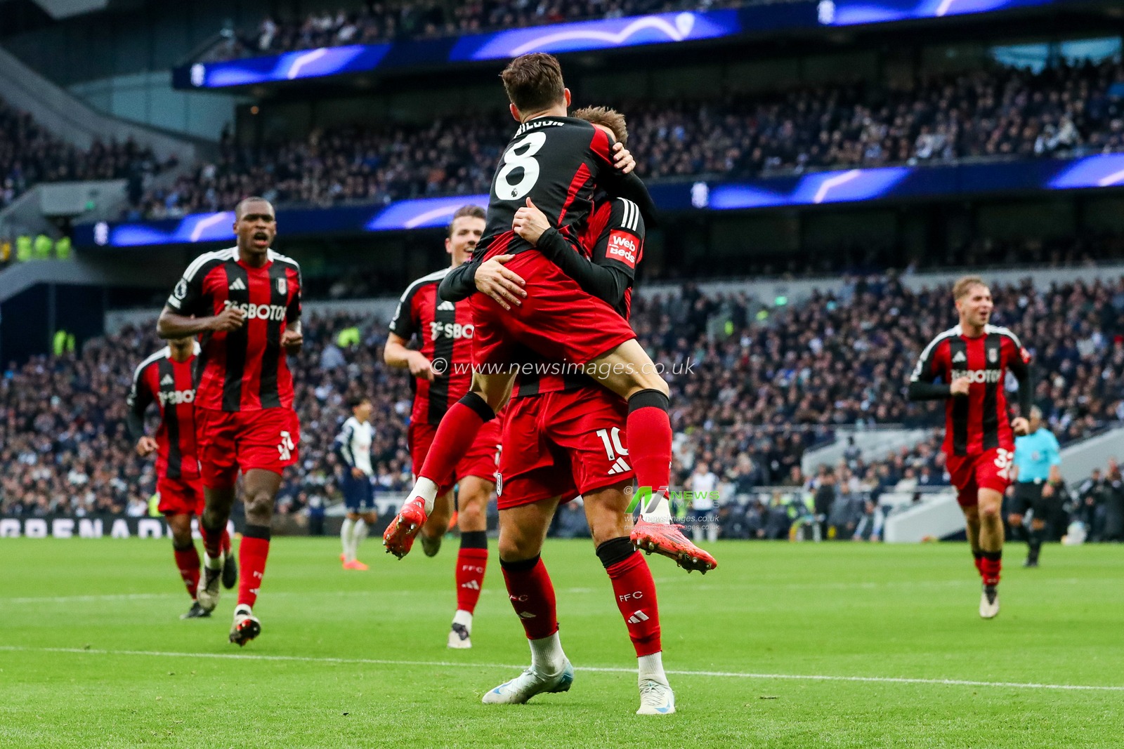 Tom Cairney of Fulham celebrates his goal with Harry Wilson to make it 1-1 during the Premier League match Tottenham Hotspur vs Fulham at Tottenham Hotspur Stadium, London, United Kingdom, 1st December 2024

(Photo by Izzy Poles/News Images)