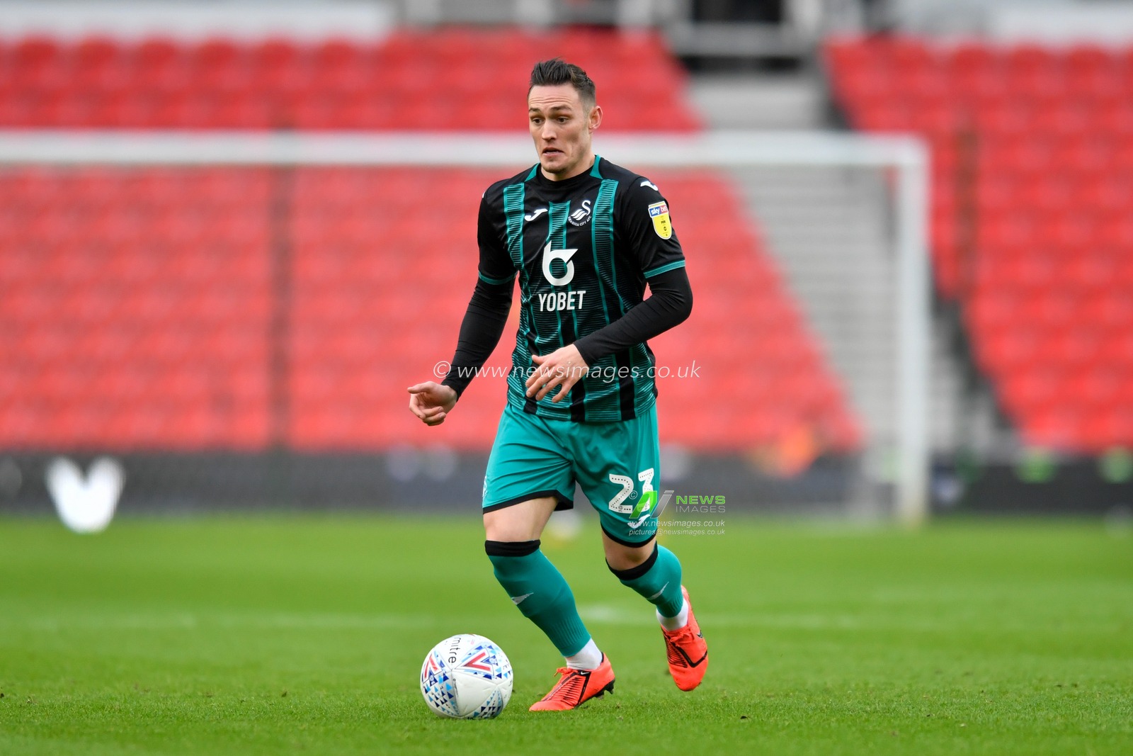 25th January 2020, Bet365 Stadium, Stoke-on-Trent, England; Sky Bet Championship, Stoke City v Swansea City : Connor Roberts (23) of Swansea City runs forward with the ball