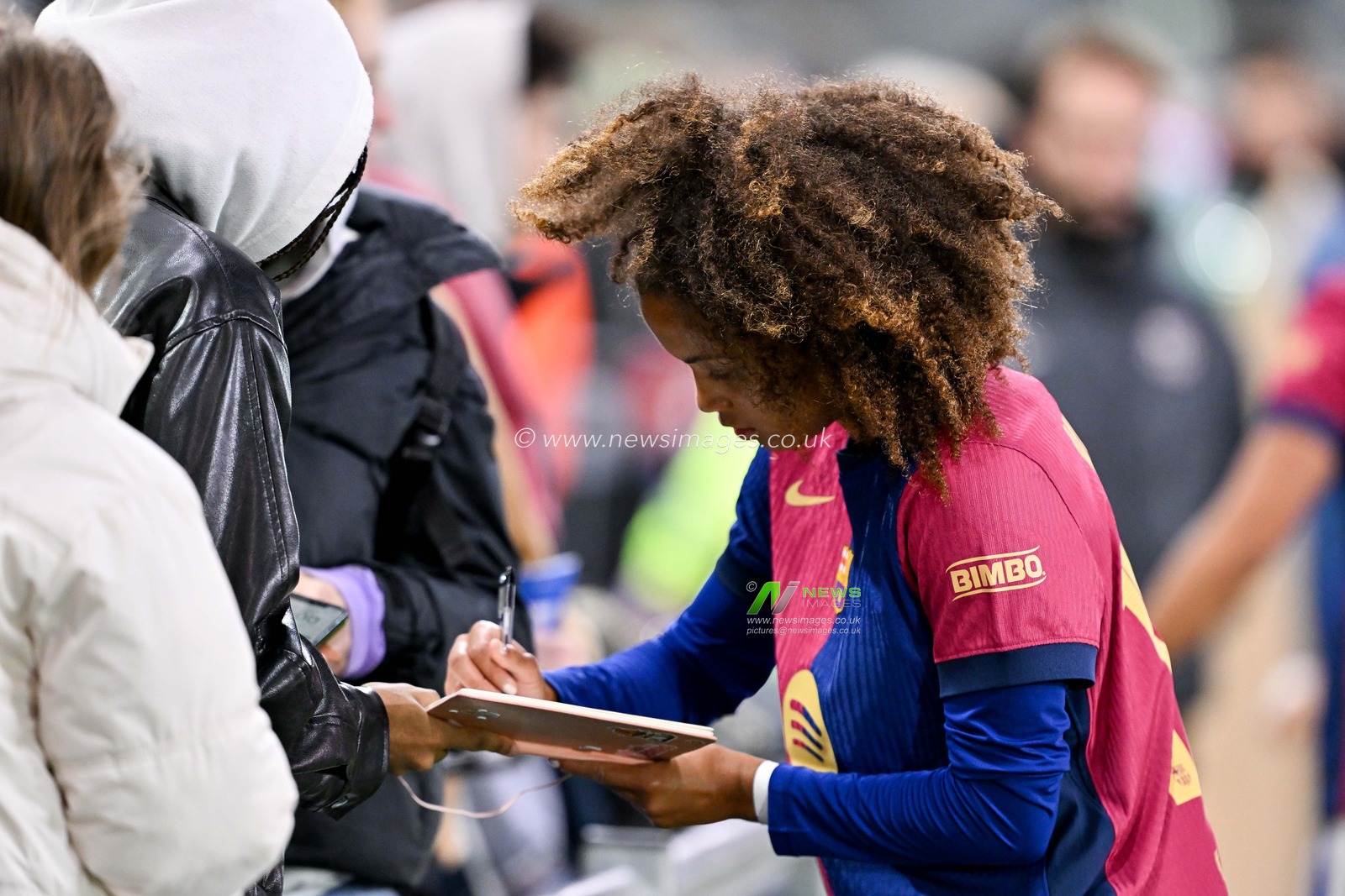 Vicky LÃ³pez of Barcelona FemenÃ­ signs autographs following the UEFA Women's Champions League match  - Group D - Manchester City vs Barcelona at Manchester City Academy Stadium, Manchester, United Kingdom, 9th October 2024

(Photo by Cody Froggatt/News Images)