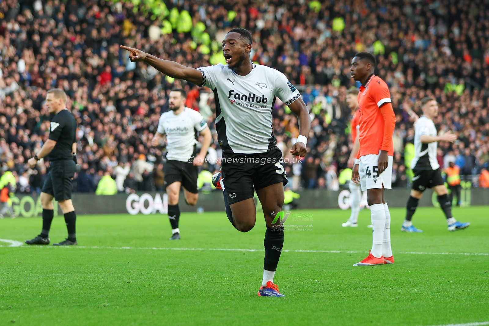 Ebou Adams of Derby County celebrates his goal to make it 1-0 during the Sky Bet Championship match Derby County vs Sheffield Wednesday at Pride Park Stadium, Derby, United Kingdom, 1st December 2024

(Photo by Alex Roebuck/News Images)
