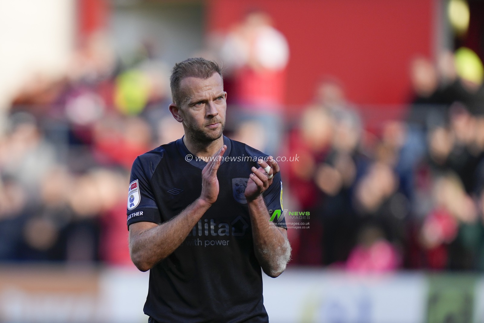 Jordan Rhodes #9 of Huddersfield Town salutes the fans after the Sky Bet Championship match Rotherham United vs Huddersfield Town at AESSEAL New York Stadium, Rotherham, United Kingdom, 15th October 2022

(Photo by Steve Flynn/News Images)