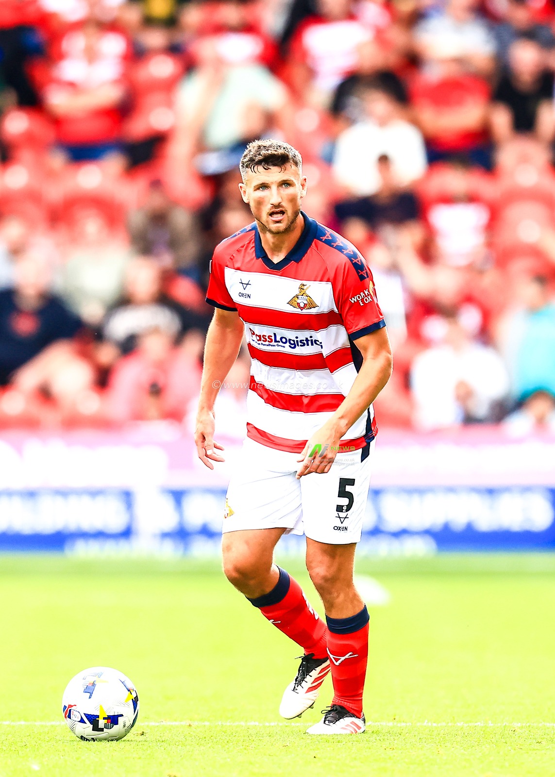 Matty Pearson of Doncaster Rovers on the ball during the Sky Bet League 1 match Doncaster Rovers vs Exeter City at Eco-Power Stadium, Doncaster, United Kingdom, 2nd August 2025

(Photo by Richard Bierton/News Images)