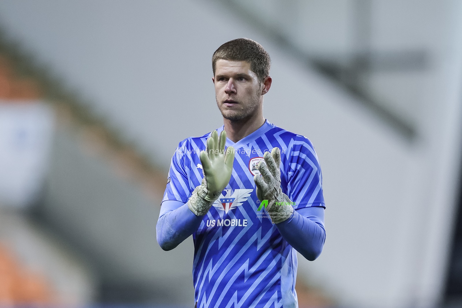 Ben Killip #23 of Barnsley applauds the travelling fans during the Bristol Street Motors Trophy match Blackpool vs Barnsley at Bloomfield Road, Blackpool, United Kingdom, 5th December 2023

(Photo by Mark Cosgrove/News Images)