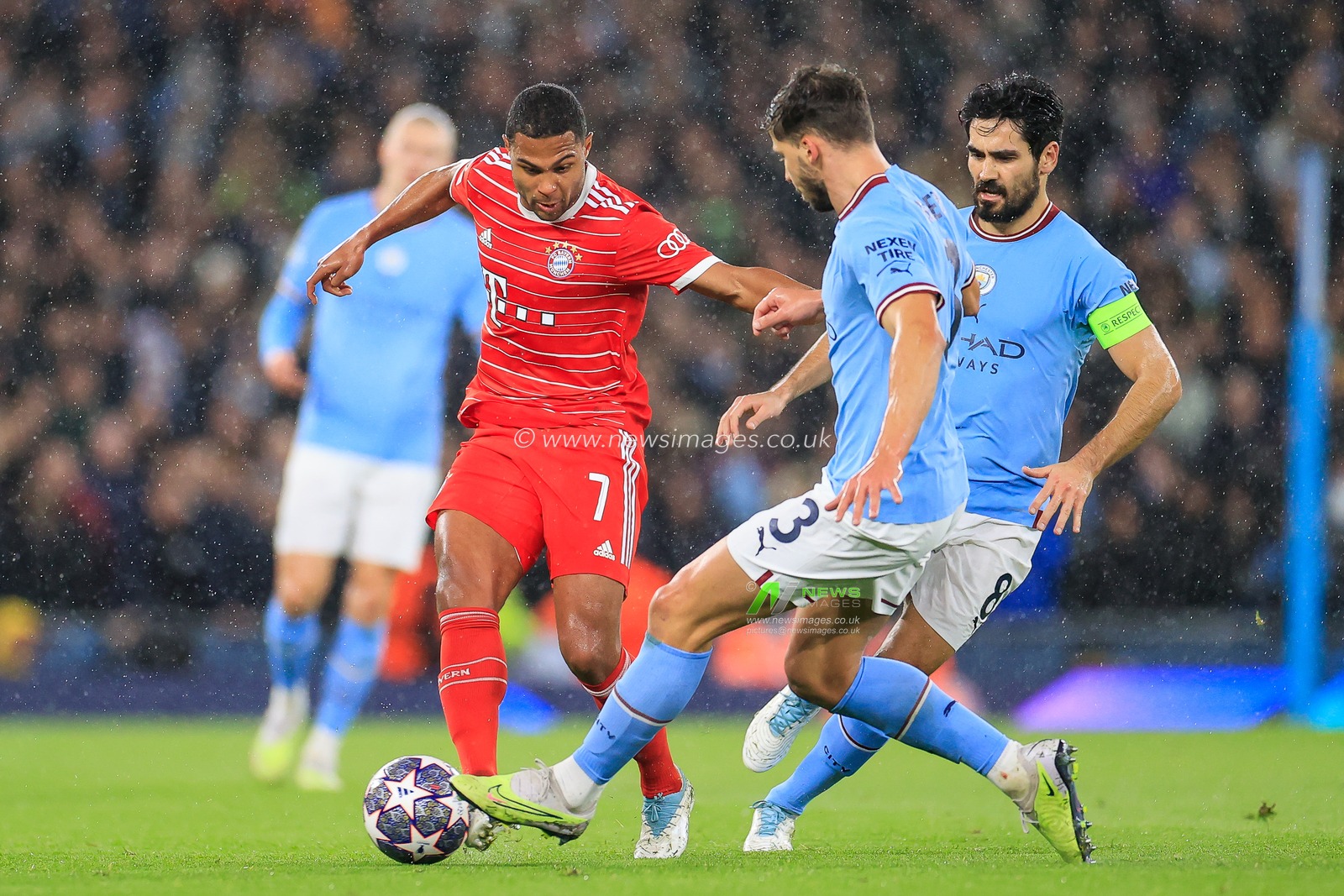 Serge Gnabry #7 of Bayern Munich is tackled by RÃºben Dias #3 of Manchester City during the UEFA Champions League Quarter-Finals 1st Leg Manchester City vs Bayern Munich at Etihad Stadium, Manchester, United Kingdom, 11th April 2023

(Photo by Conor Molloy/News Images)