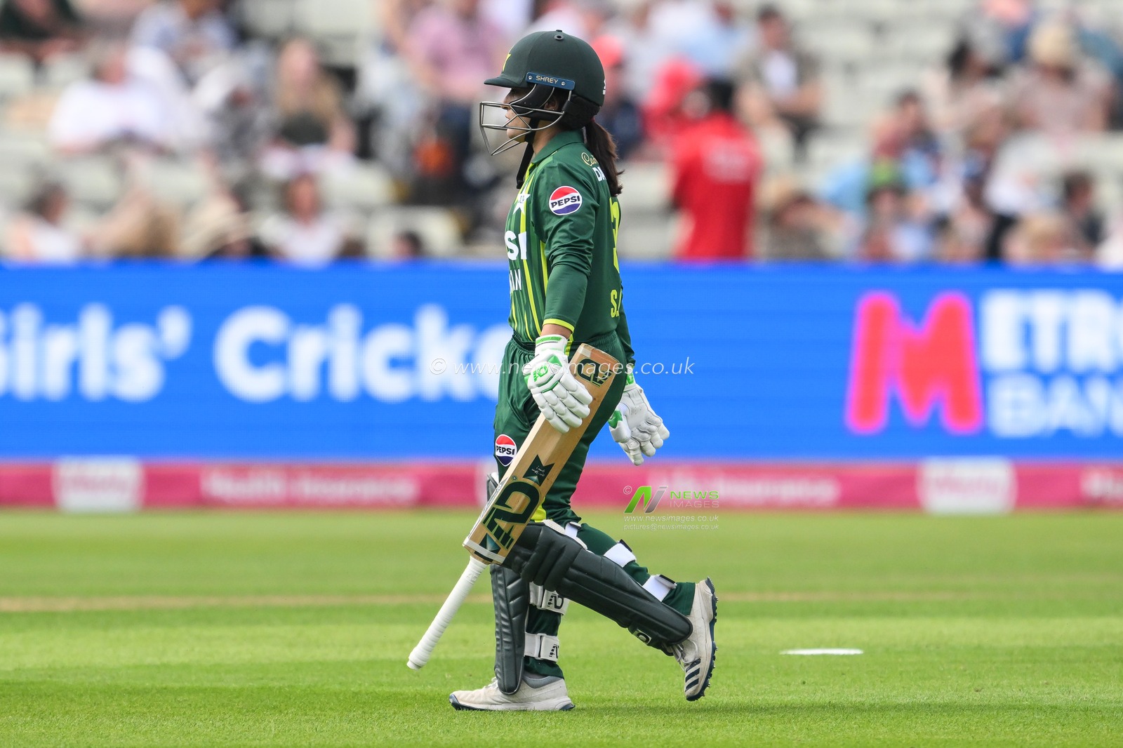Sidra Amin of Pakistan leaves the field after being caught LBW off the bowling of Charlie Dean of England during the First T20 International match England women vs Pakistan women at Edgbaston, Birmingham, United Kingdom, 11th May 2024

(Photo by Craig Thomas/News Images)