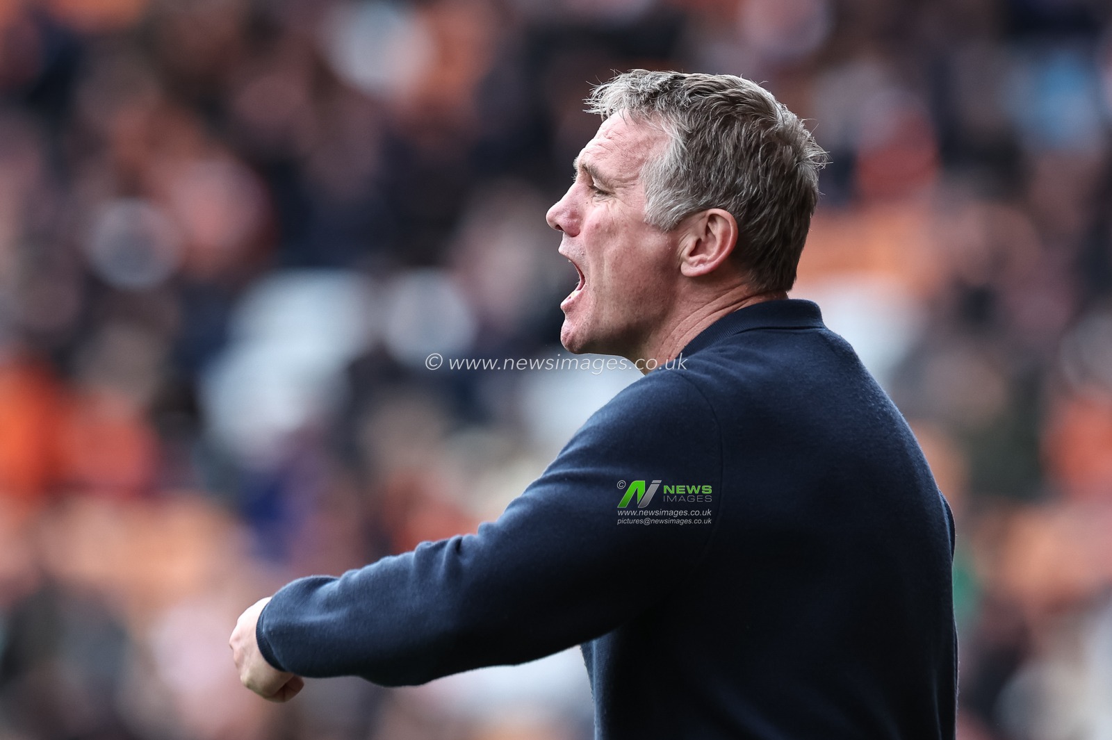 Phil Parkinson manager of Wrexham reacts in the technical area during the Sky Bet League 1 match Blackpool vs Wrexham at Bloomfield Road, Blackpool, United Kingdom, 21st April 2025

(Photo by Mark Cosgrove/News Images)