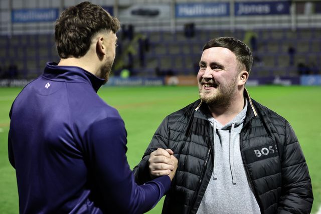 Matty Ashton of Warrington Wolves shakes hands with Luke Littler during the Betfred Super League Round 2 match Warrington Wolves vs Catalans Dragons at Luke Littler Stadium, Warrington, United Kingdom, 21st February 2025

(Photo by Mark Cosgrove/News Images)