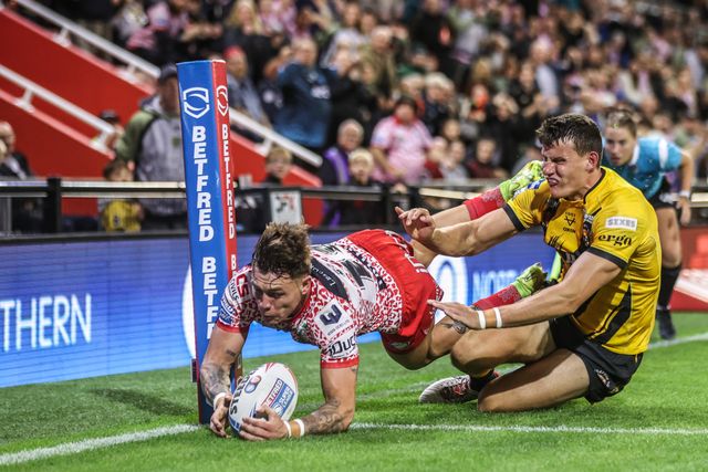 Keanan Brand of Leigh Leopards goes over for a try during the Betfred Super League round 25 match Leigh Leopards vs Castleford Tigers at Leigh Sports Village, Leigh, United Kingdom, 28th August 2025

(Photo by Alfie Cosgrove/News Images)