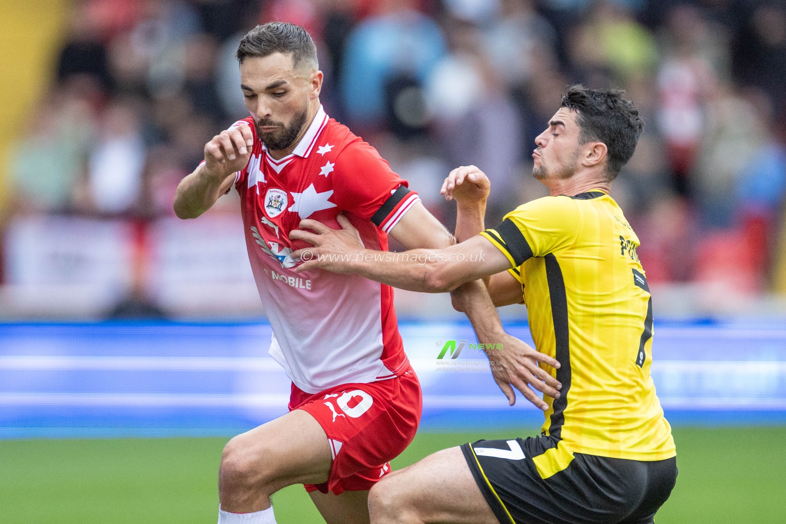 Adam Phillips #30 of Barnsley and Joe Powell #7 of Burton Albion battle for the ball during the Sky Bet League 1 match Barnsley vs Burton Albion at Oakwell, Barnsley, United Kingdom, 16th September 2023

(Photo by Mark Cosgrove/News Images)