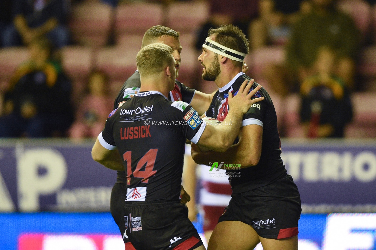 20th September 2019 , DW Stadium, Wigan, England;  Betfred Super League, Round  Playoffs, Wigan Warriors vs Salford Red Devils ; George Griffin (12) of Salford Red Devils celebrates scoring his try making it 6-4


Credit: Richard Long/News Images