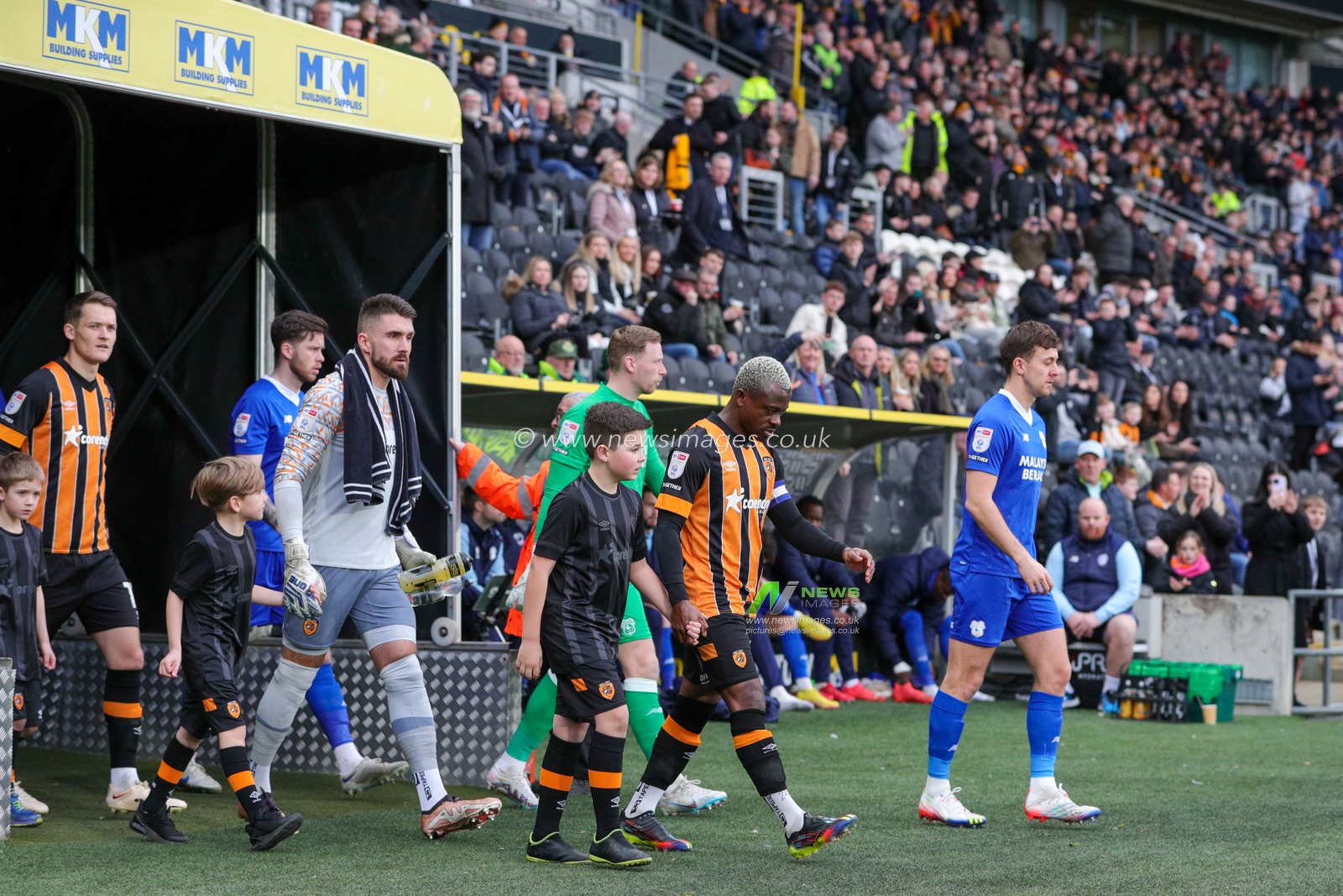 The two teams walk out of the tunnel ahead of the Sky Bet Championship match Hull City vs Cardiff City at MKM Stadium, Hull, United Kingdom, 4th February 2023

(Photo by James Heaton/News Images)
