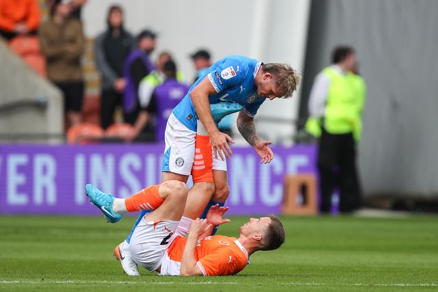 Lee Evans of Blackpool and Will Collar of Stockport County have a coming together during the Sky Bet League 1 match Blackpool vs Stockport County at Bloomfield Road, Blackpool, United Kingdom, 17th August 2024

(Photo by Gareth Evans/News Images)