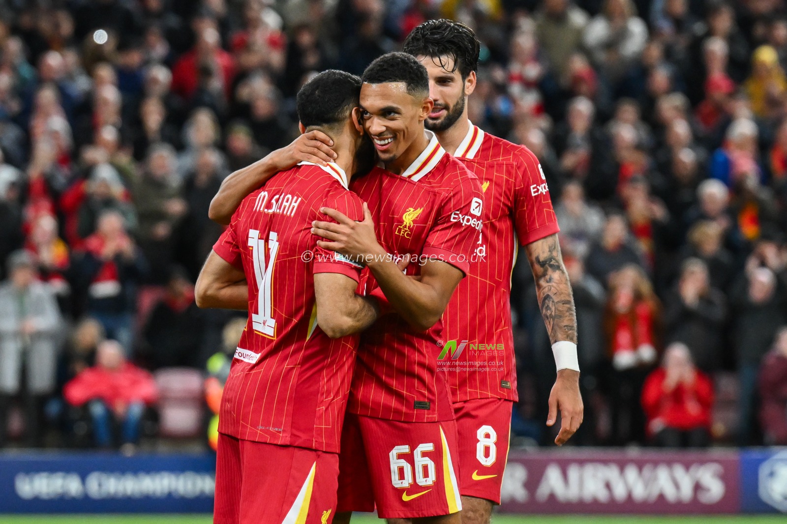 Mohamed Salah of Liverpool celebrates his goal with Trent Alexander-Arnold during the UEFA Champions League  - League Stage match Liverpool vs Bologna at Anfield, Liverpool, United Kingdom, 2nd October 2024

(Photo by Craig Thomas/News Images)