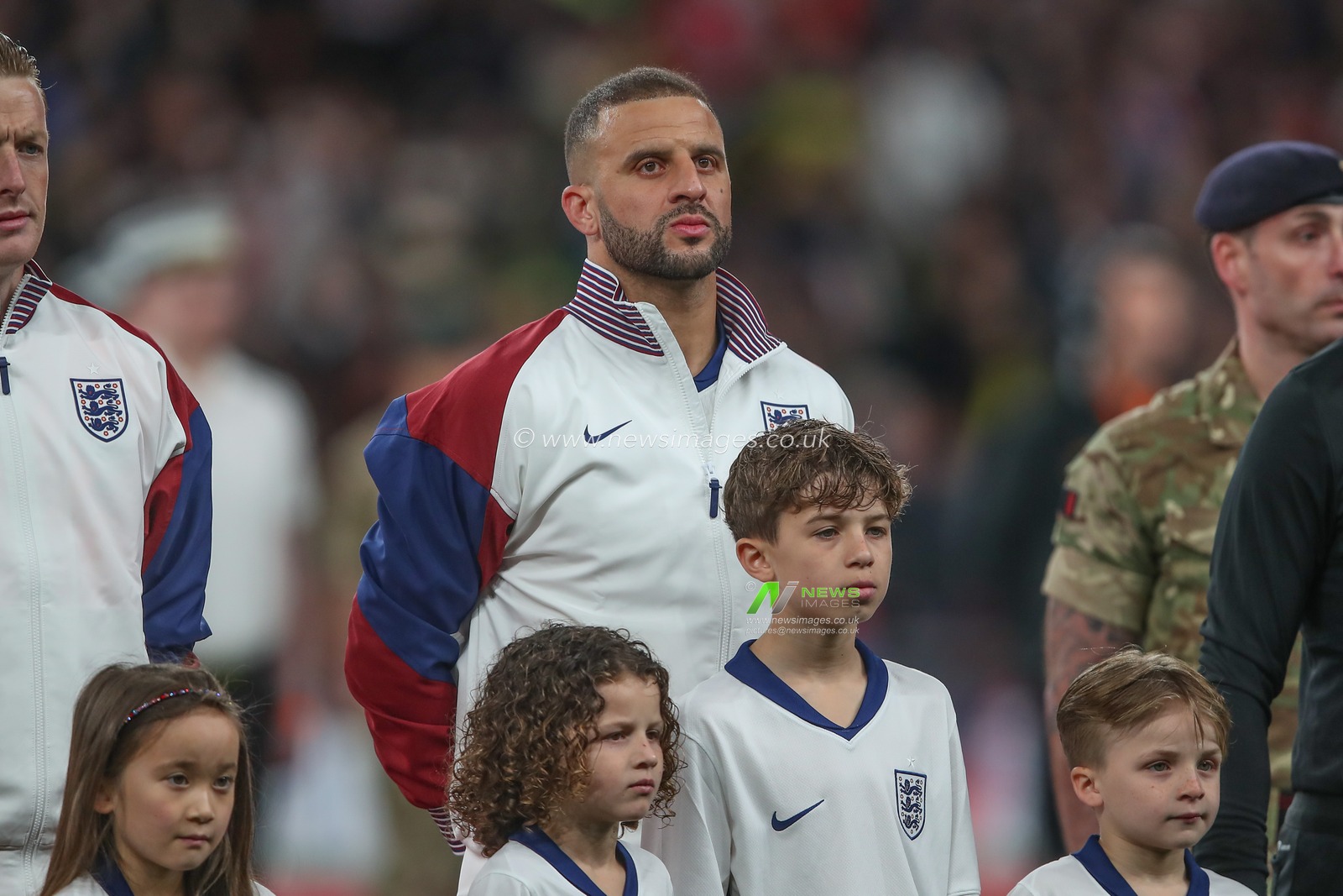 Kyle Walker of England during the national anthem ahead of the International Friendly match England vs Brazil at Wembley Stadium, London, United Kingdom, 23rd March 2024

(Photo by Gareth Evans/News Images)