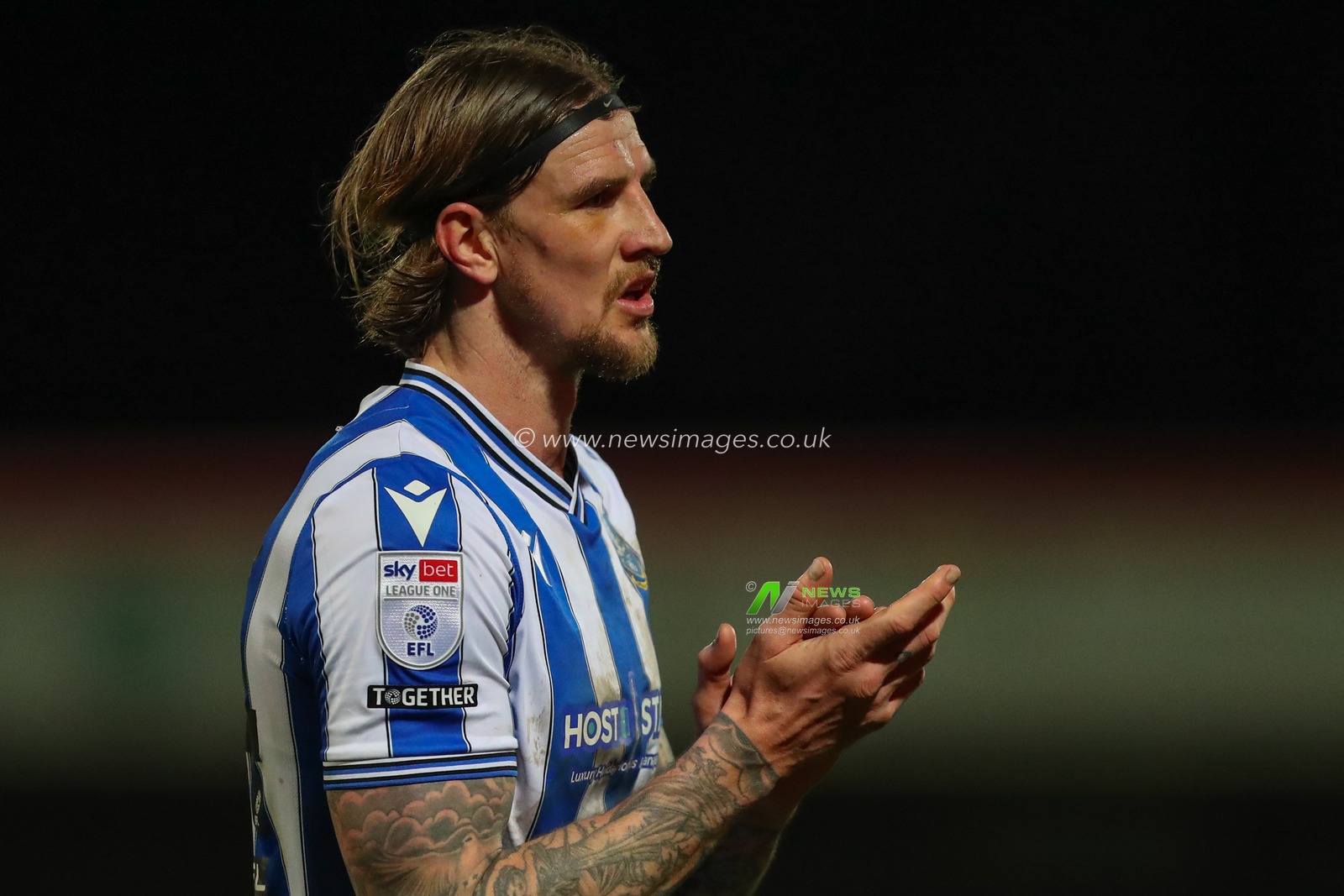 Aden Flint #44 of Sheffield Wednesday applauds the travelling fans after the Sky Bet League 1 match Cheltenham Town vs Sheffield Wednesday at The Completely-Suzuki Stadium, Cheltenham, United Kingdom, 29th March 2023

(Photo by Gareth Evans/News Images)