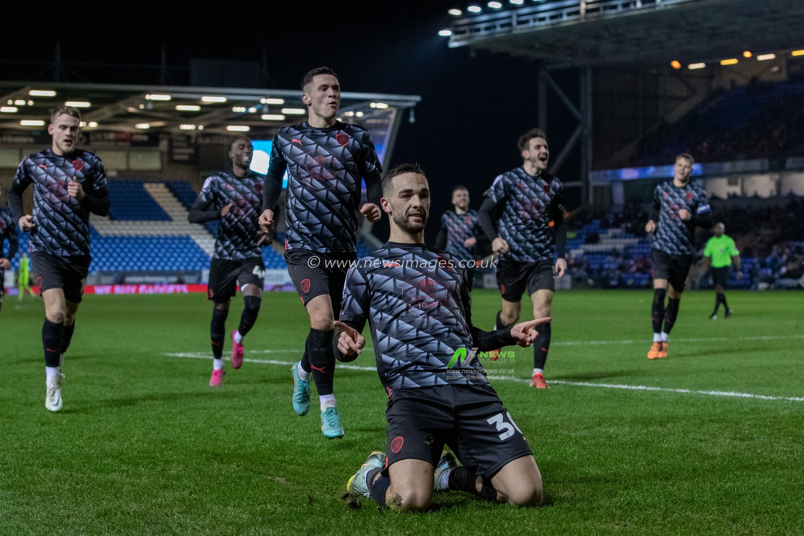 Adam Phillips #30 of Barnsley celebrates his goal and makes the score 1-2 during the Sky Bet League 1 match Peterborough vs Barnsley at Weston Homes Stadium, Peterborough, United Kingdom, 2nd December 2022

(Photo by James Heaton/News Images)