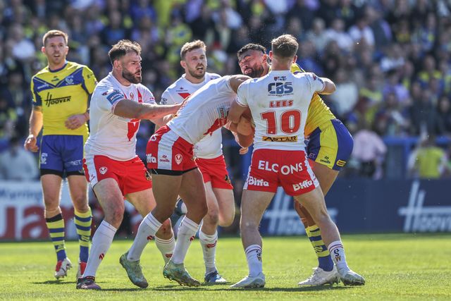 Zane Musgrove of Warrington is tackled by Matty Lees of St. Helens and Moses Mbye of St. Helens Wolves during the Betfred Challenge Cup Quarter Final match Warrington Wolves vs St Helens at Halliwell Jones Stadium, Warrington, United Kingdom, 6th April 2025

(Photo by Alfie Cosgrove/News Images)