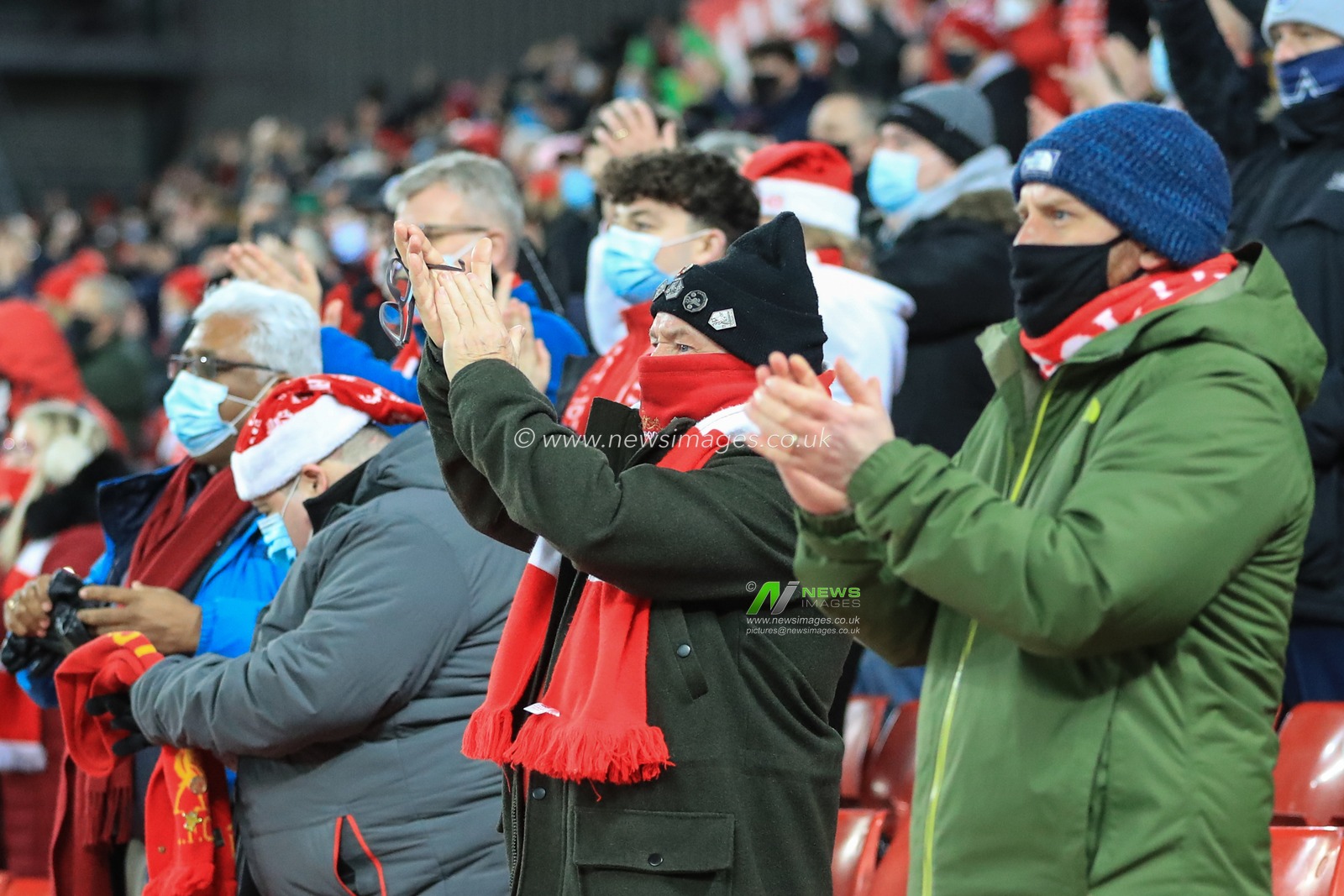Liverpool fans clap just before kick-off