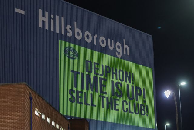 Fans protest against Sheffield Wednesday owner Dejphon Chansiri as they shine projected images onto the Kop stand during the Sky Bet Championship match Sheffield Wednesday vs Middlesbrough at Hillsborough, Sheffield, United Kingdom, 22nd October 2025

(Photo by Mark Cosgrove/News Images)