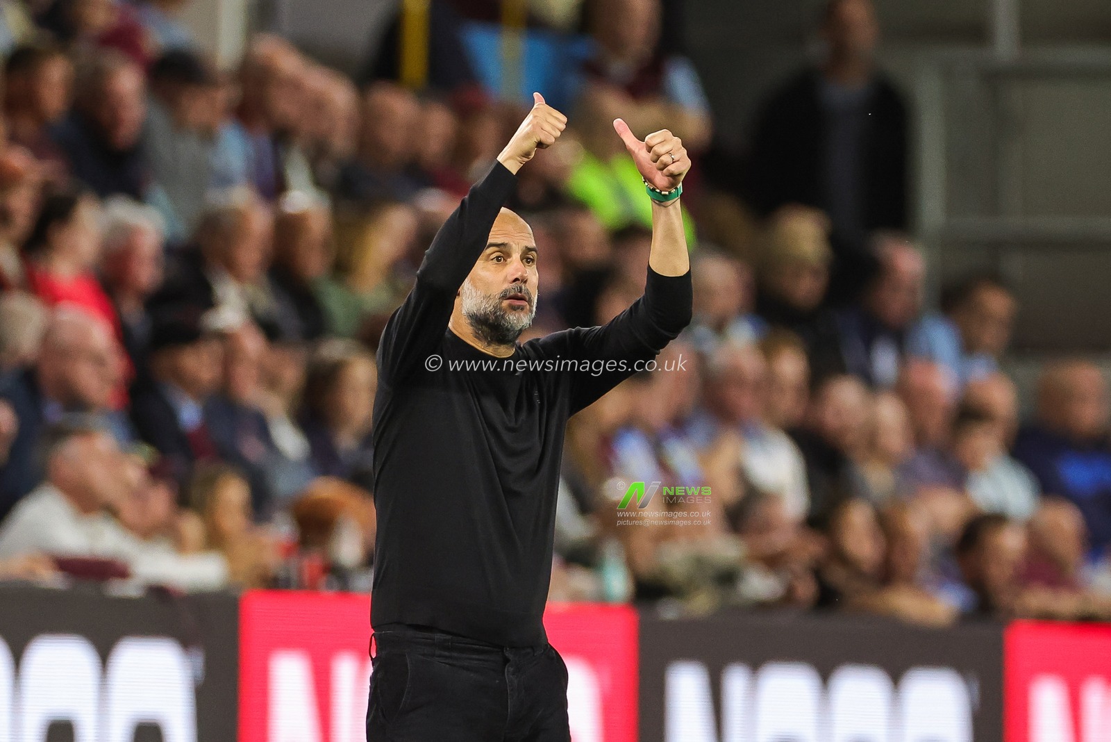 Pep Guardiola head coach of Manchester City gives his team the thumbs up during the Premier League match Burnley vs Manchester City at Turf Moor, Burnley, United Kingdom, 11th August 2023

(Photo by Mark Cosgrove/News Images)