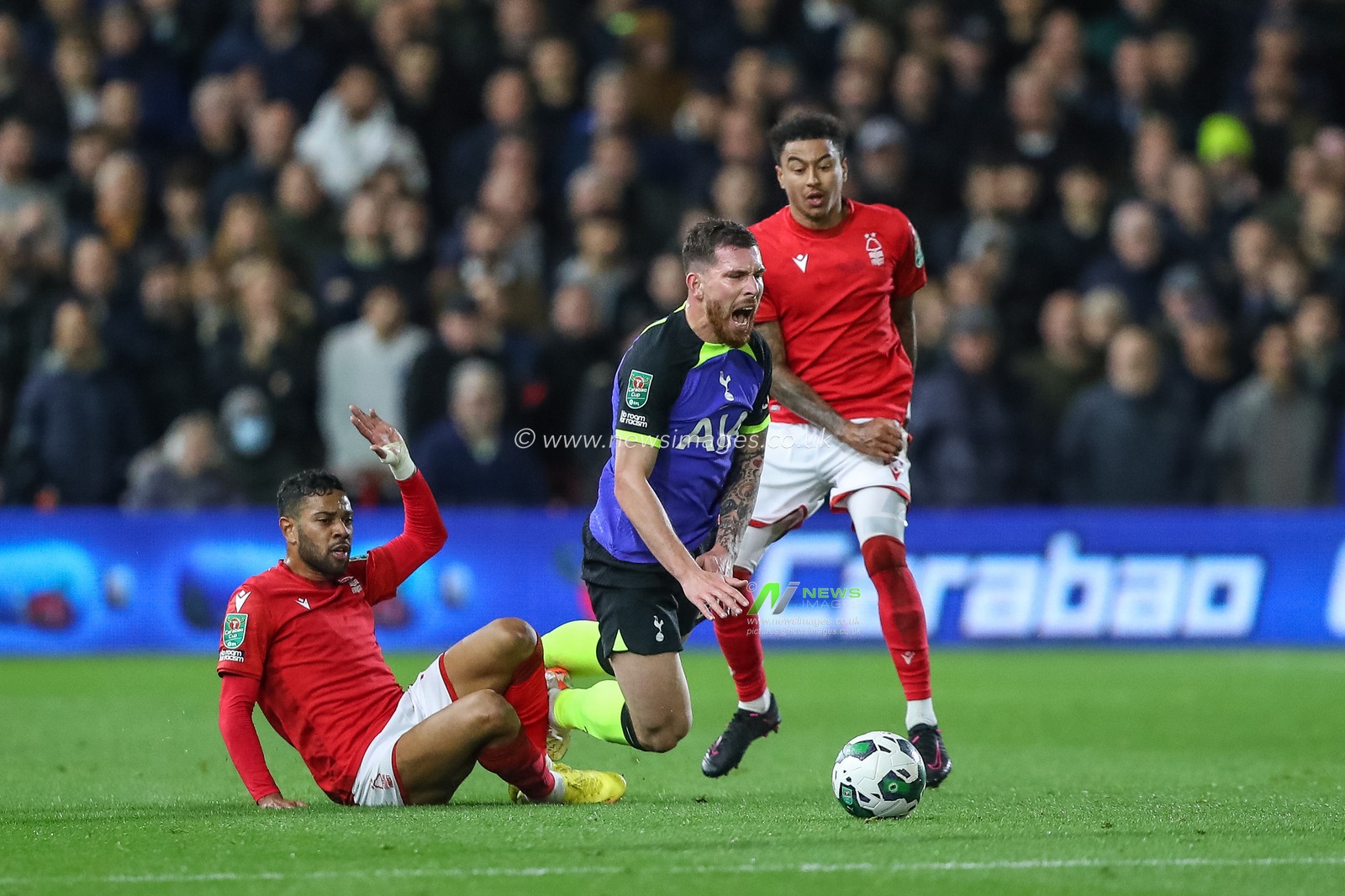 Pierre-Emile HÃ¸jbjerg #5 of Tottenham Hotspur is fouled by Renan Lodi #32 of Nottingham Forest during the Carabao Cup Third Round match Nottingham Forest vs Tottenham Hotspur at City Ground, Nottingham, United Kingdom, 9th November 2022

(Photo by Gareth Evans/News Images)